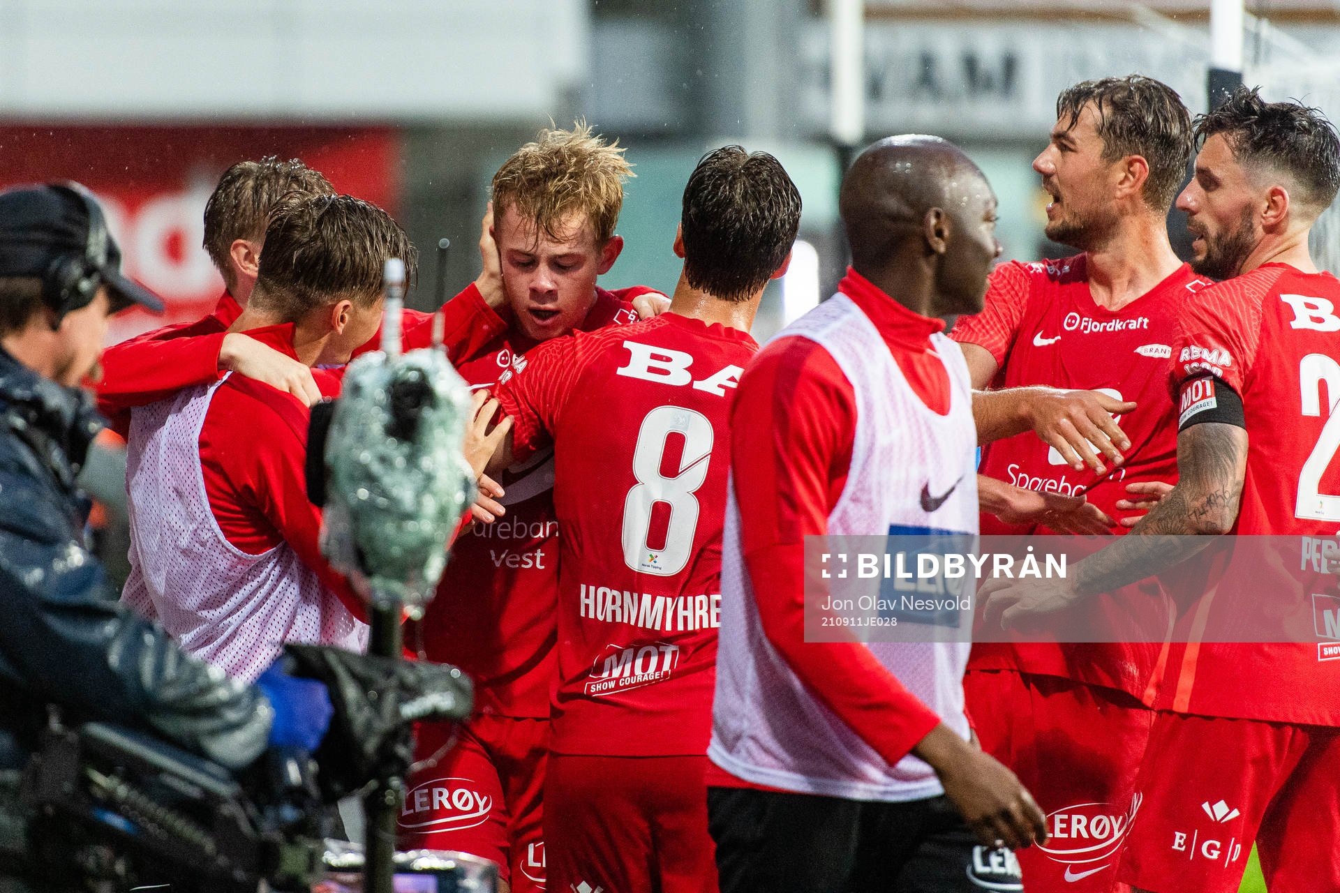 Aune Heggebø of Brann celebrates with team mates