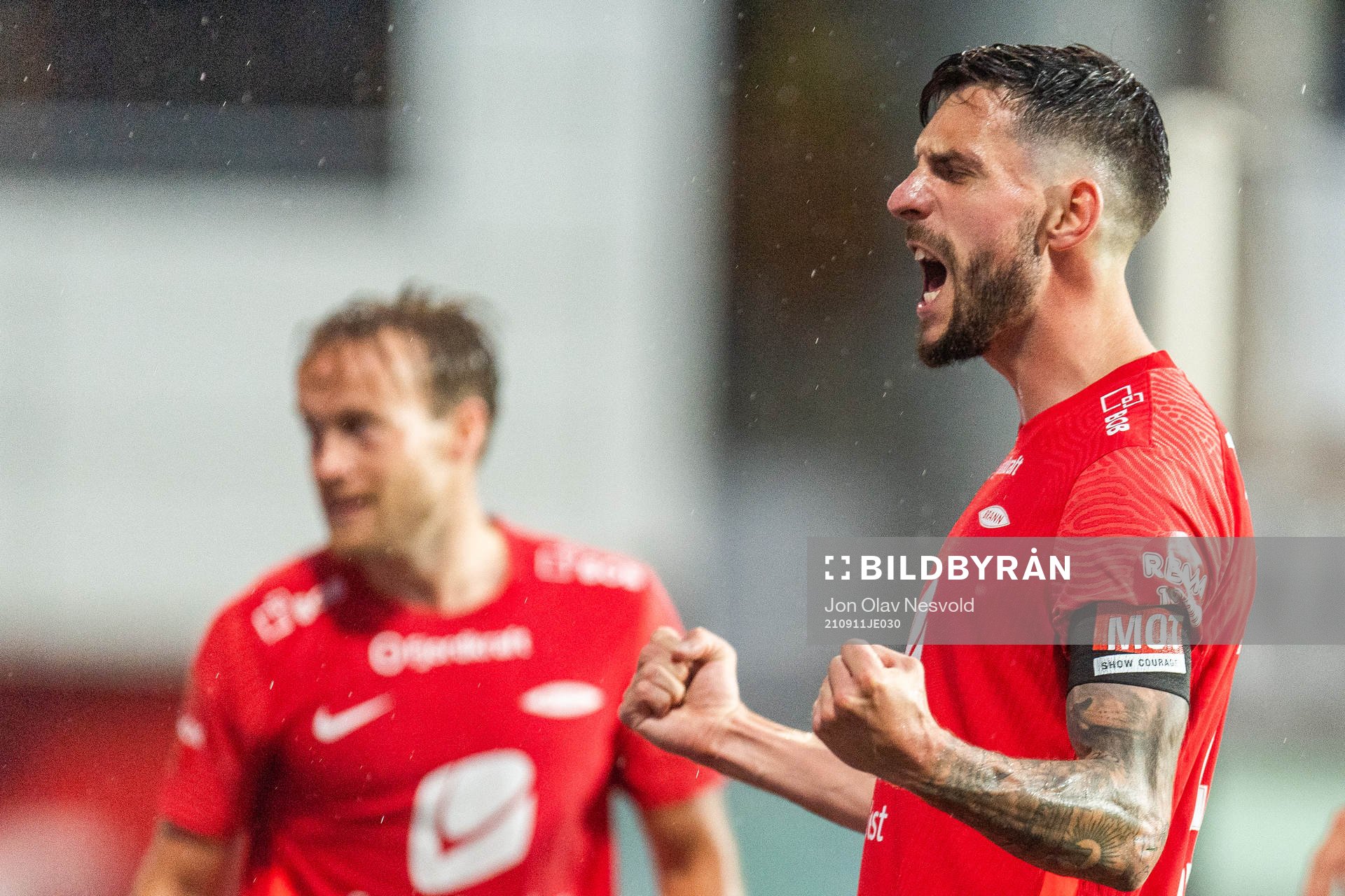 Daniel Alexander Pedersen celebrates after Aune Heggebø (not pictured scored 2-3 during the Eliteserien match between Lillestrøm and Brann on September 11, 2021 in Lillestrøm.