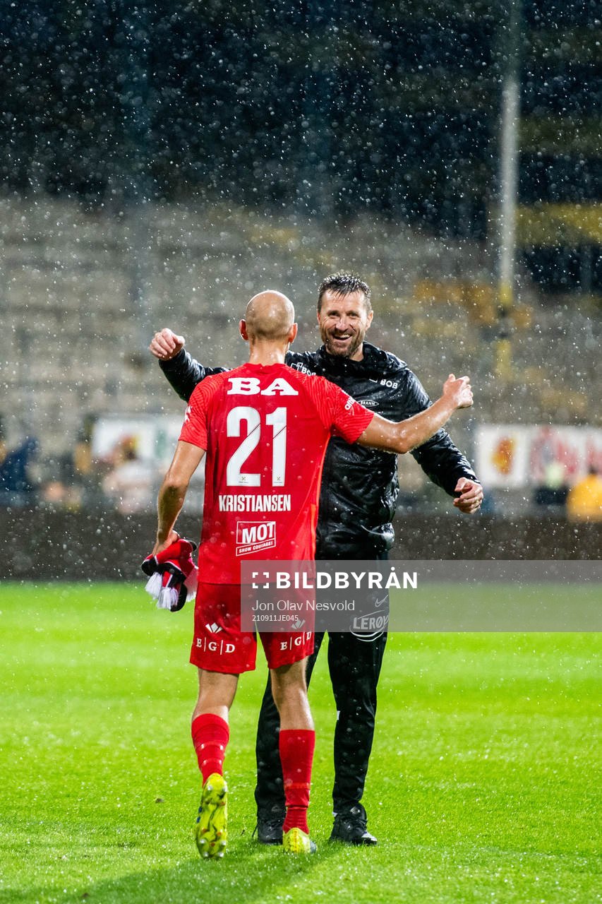 Ruben Kristiansen of Brann and Eirik Horneland, head coach of Brann, celebrate after the Eliteserien match between Lillestrøm and Brann on September 11, 2021 in Lillestrøm.