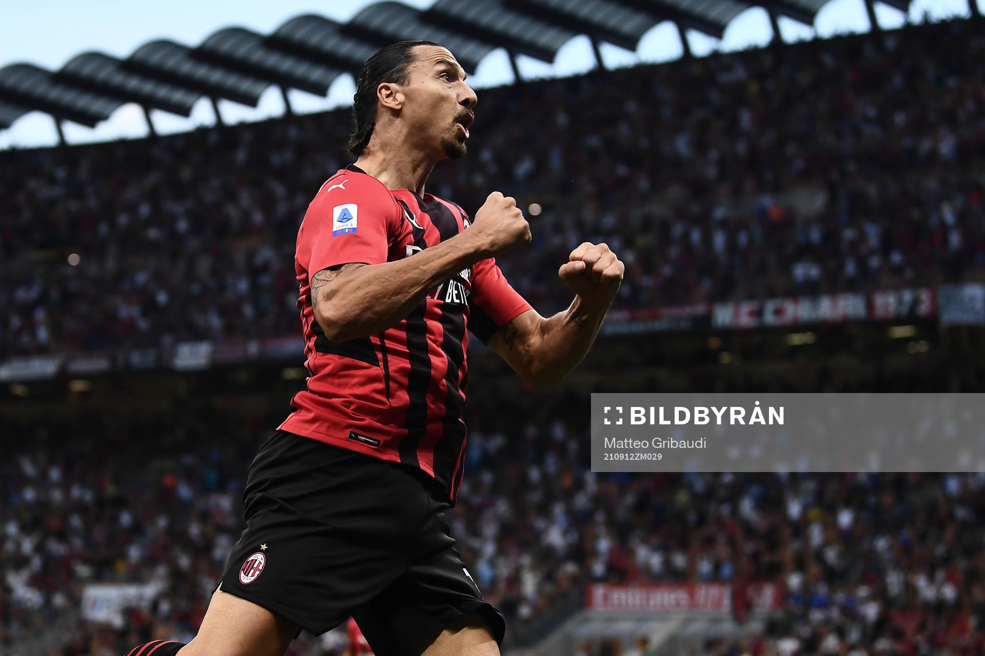 Zlatan Ibrahimovic of Milan celebrates scoring 2-0