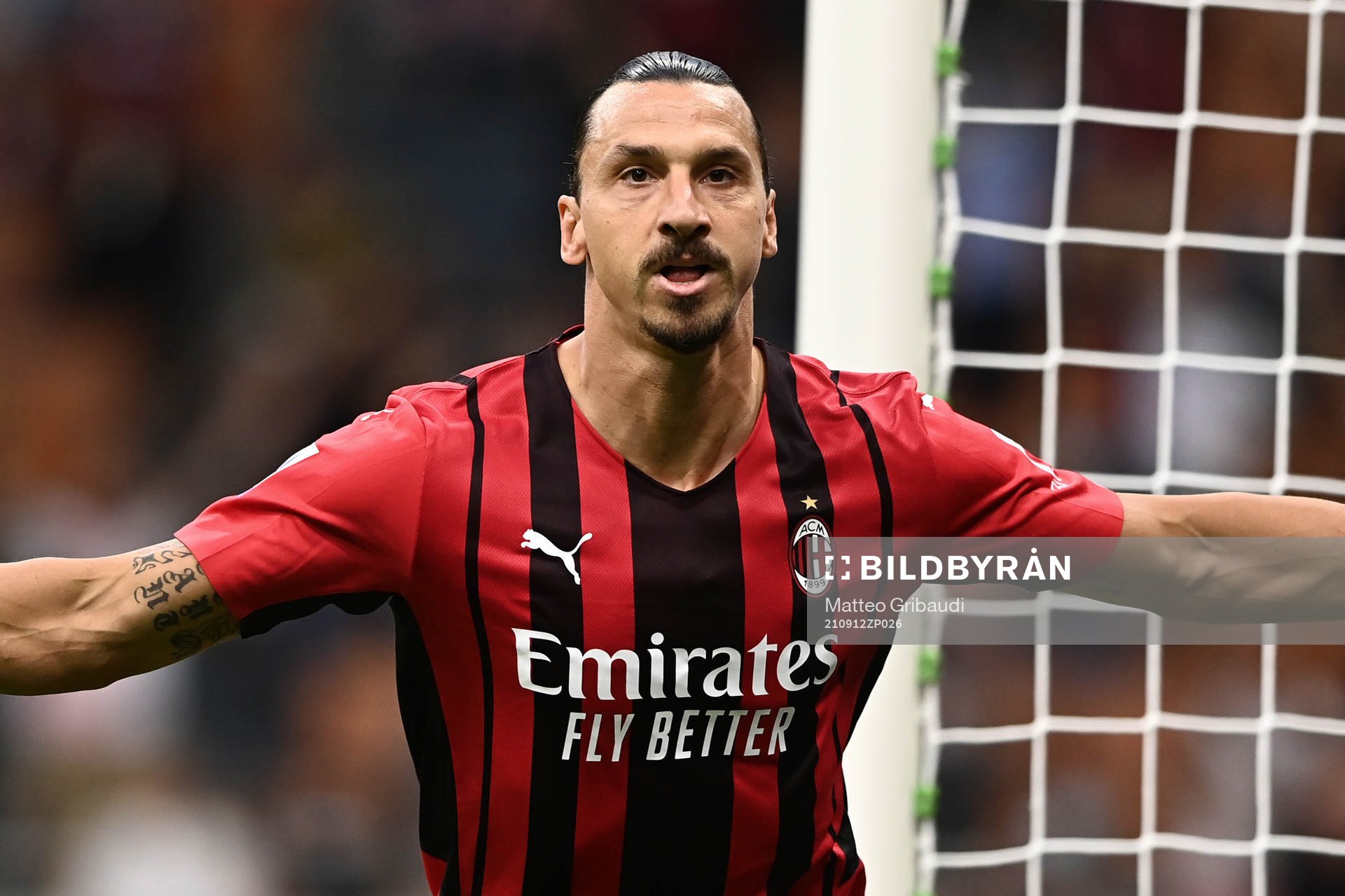 Zlatan Ibrahimovic of Milan celebrates scoring 2-0