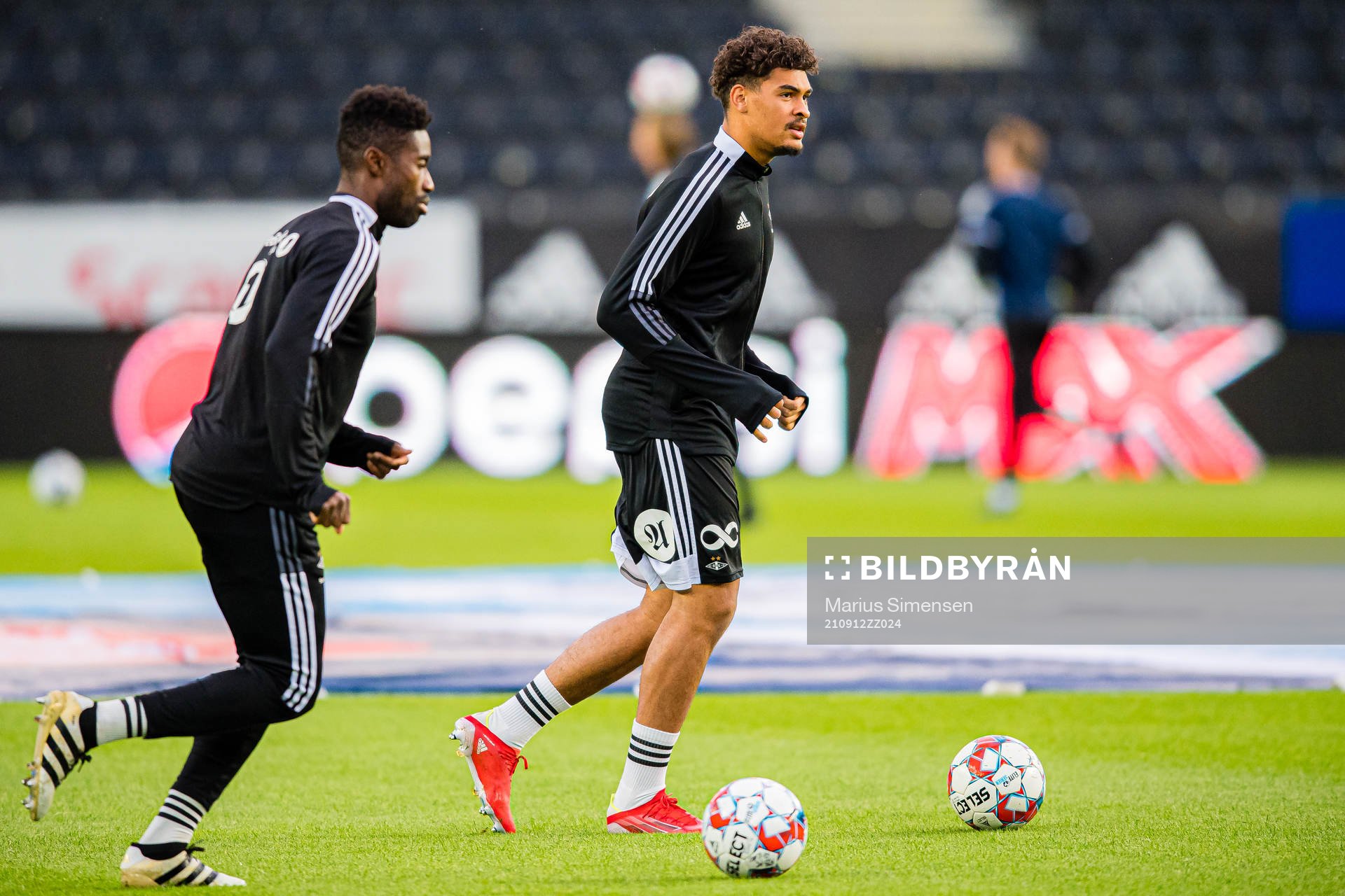 Noah Jean Holm of Rosenborg warms up ahead of during the Eliteserien match between Rosenborg and Tromsø on September 12, 2021 in Trondheim.