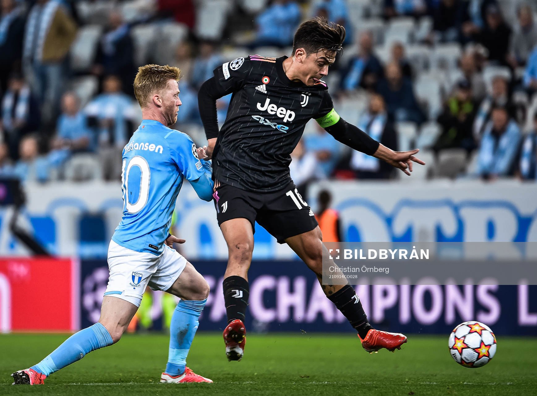 Anders Christiansen of Malmö FF and Paulo Dybala of
