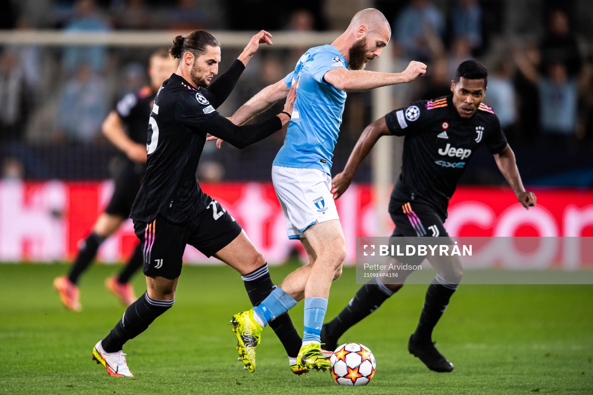Jo Inge Berget of Malmö FF against Adrien Rabiot and Alex