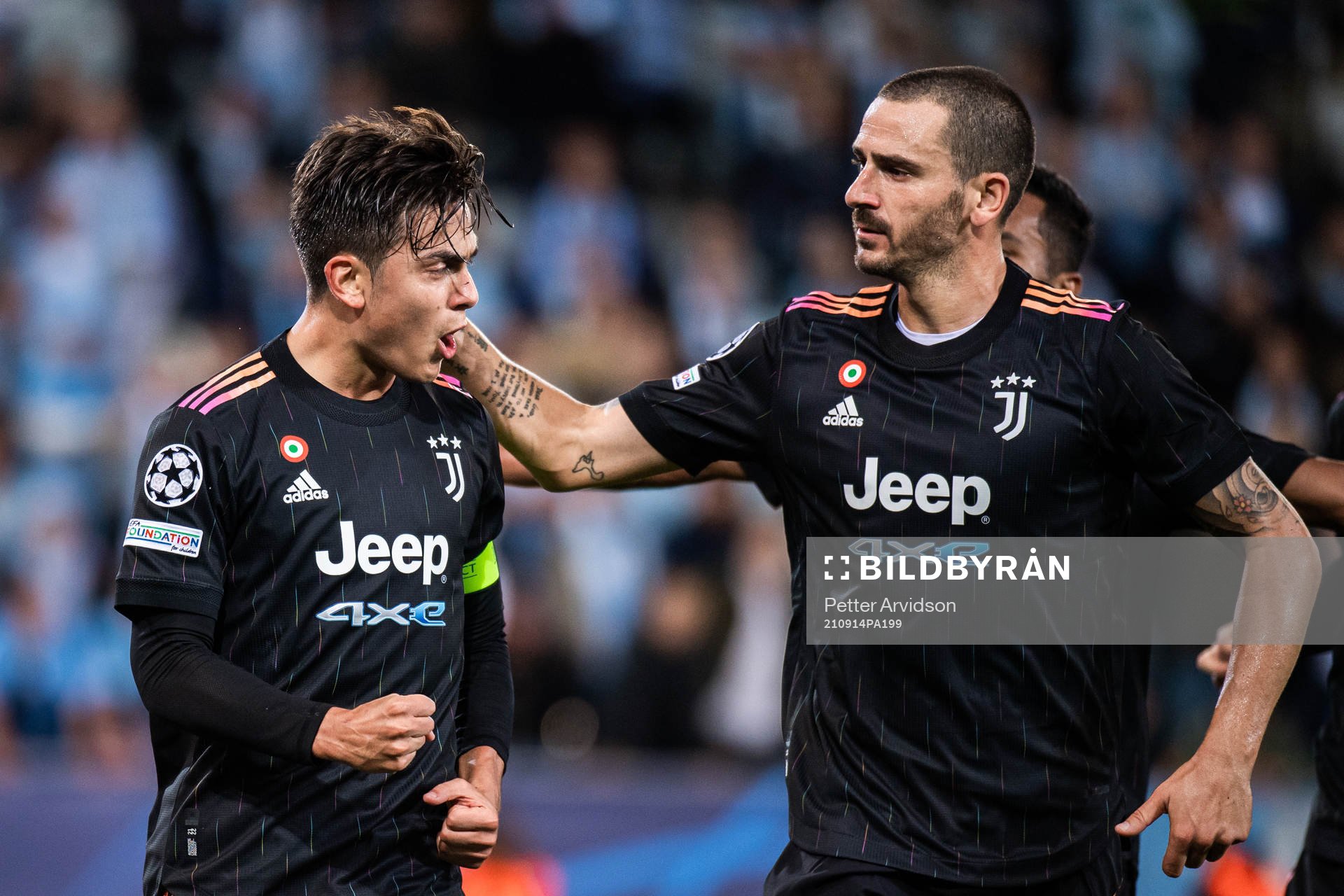 Paulo Dybala and Leonardo Bunucci of Juventus celebrate the