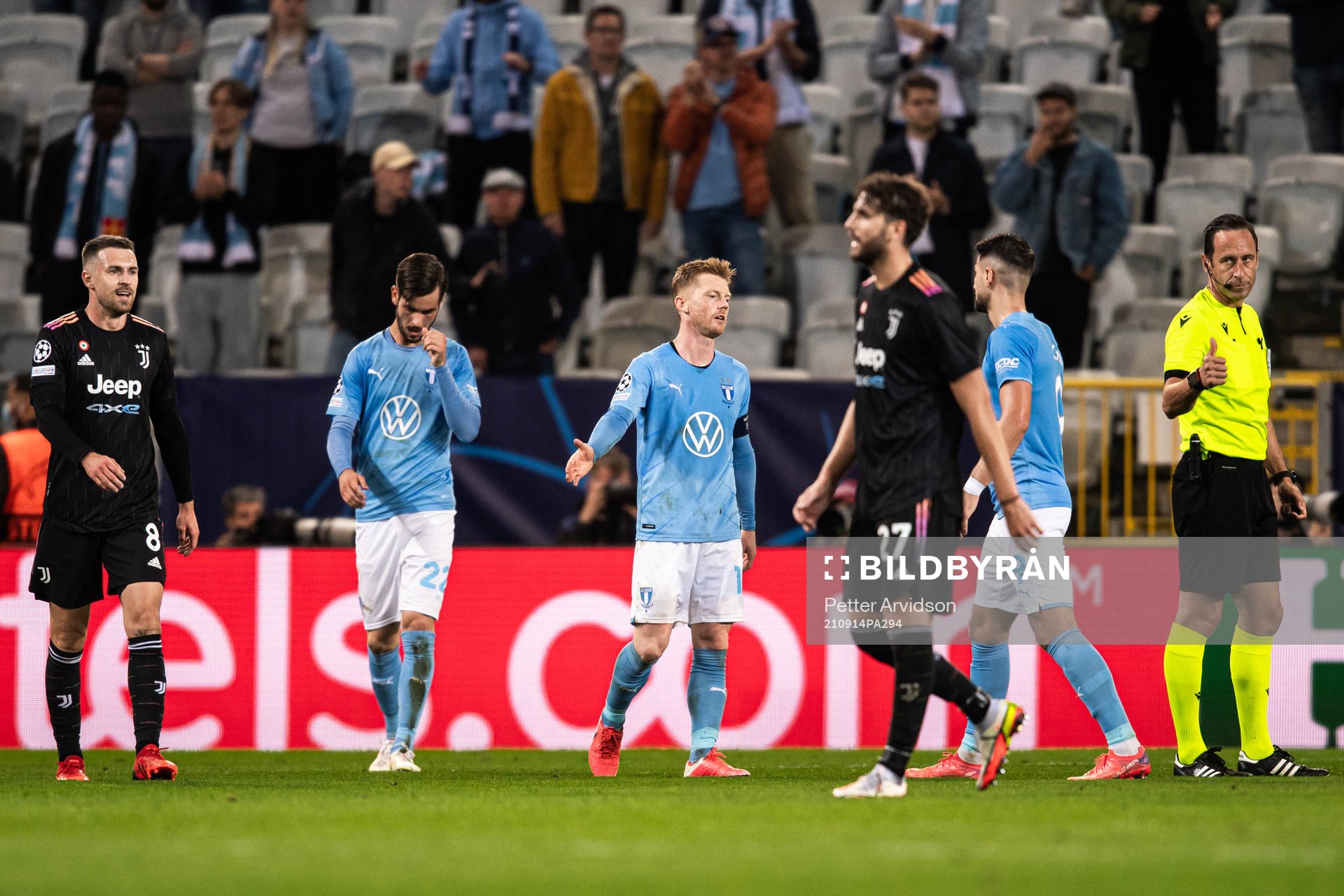 Adi Nalic and Anders Christiansen of Malmö FF look dejected