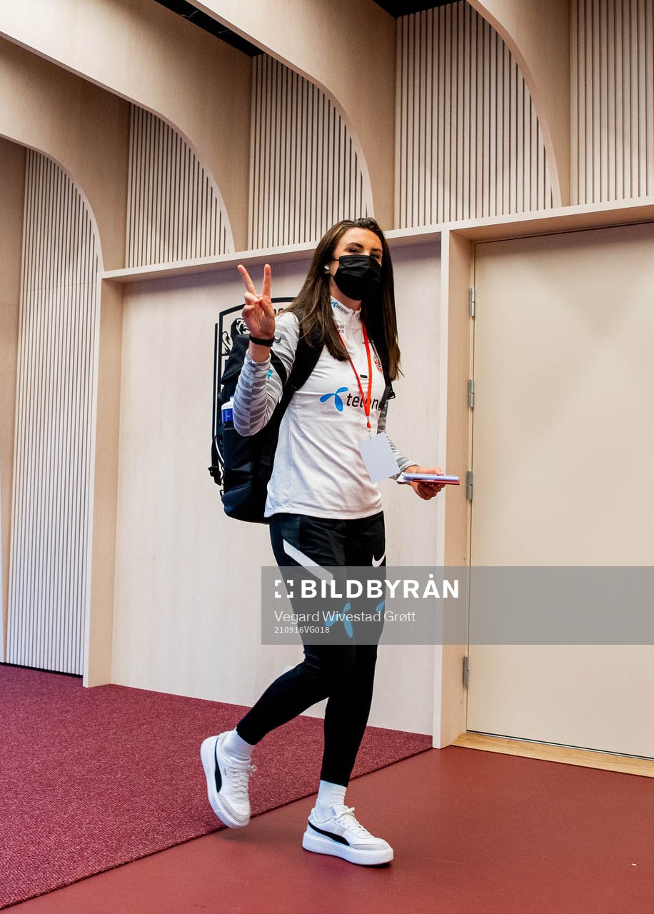 Ingrid Syrstad Engen of Norway arrives wearing a face mask