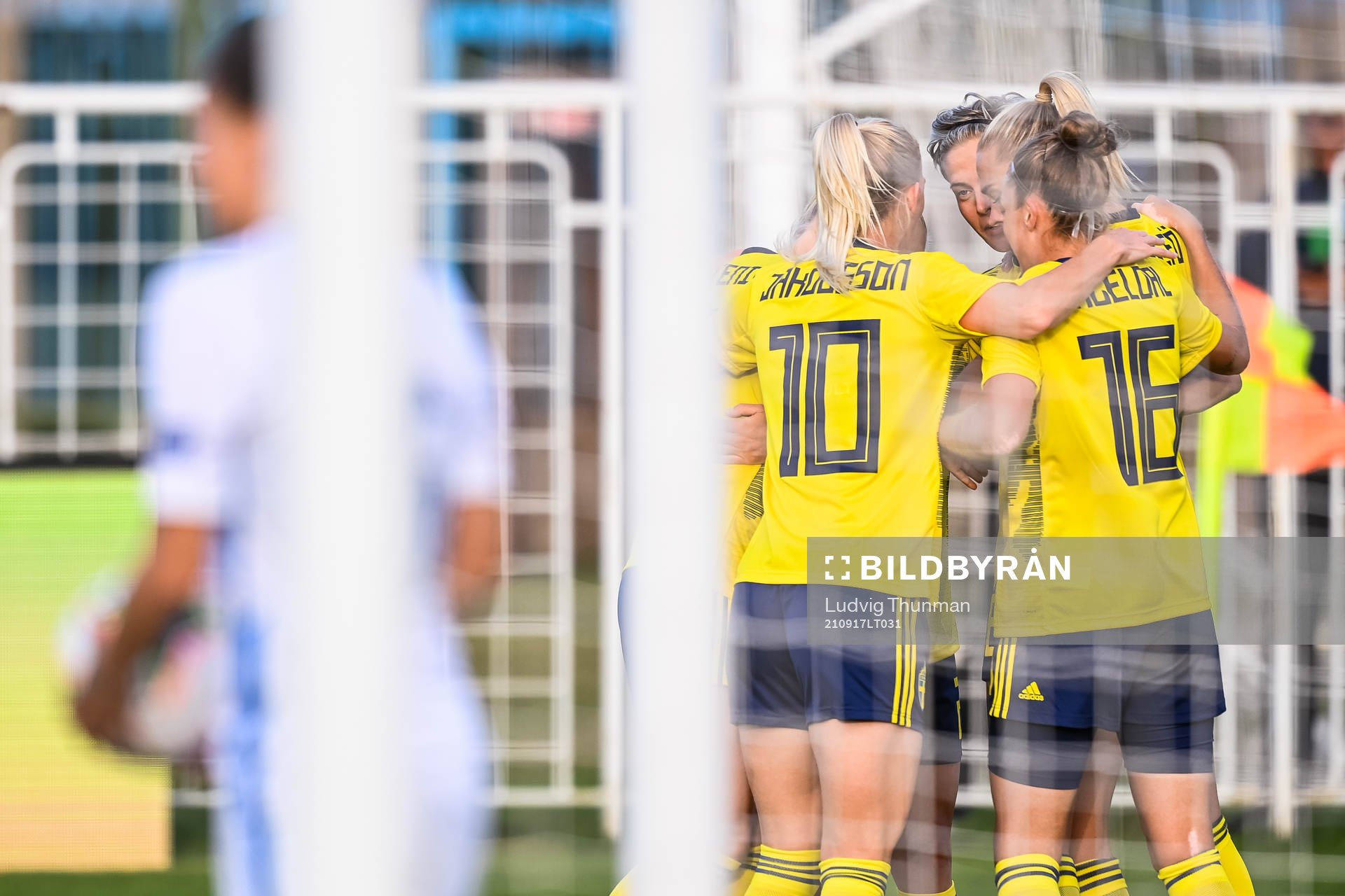 Sofia Jakobsson, Lina Hurtig and Filippa Angeldahl celebrate with Fridolina Rolfö of Sweden after she scored 0-1 during the FIFA Women's World Cup Qualifying football match between Slovakia and Sweden on September 17, 2021 in Senec.