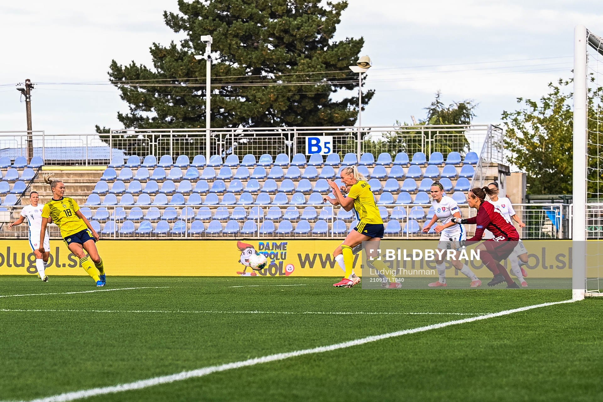 Fridolina Rolfö of Sweden scores 0-1 behind goalkeeper