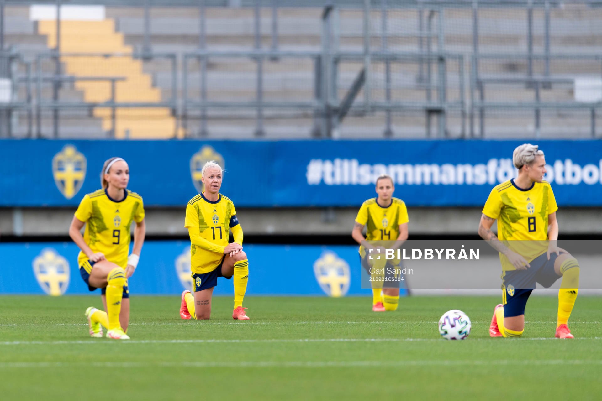 Caroline Seger of Sweden takes a knee in support of the