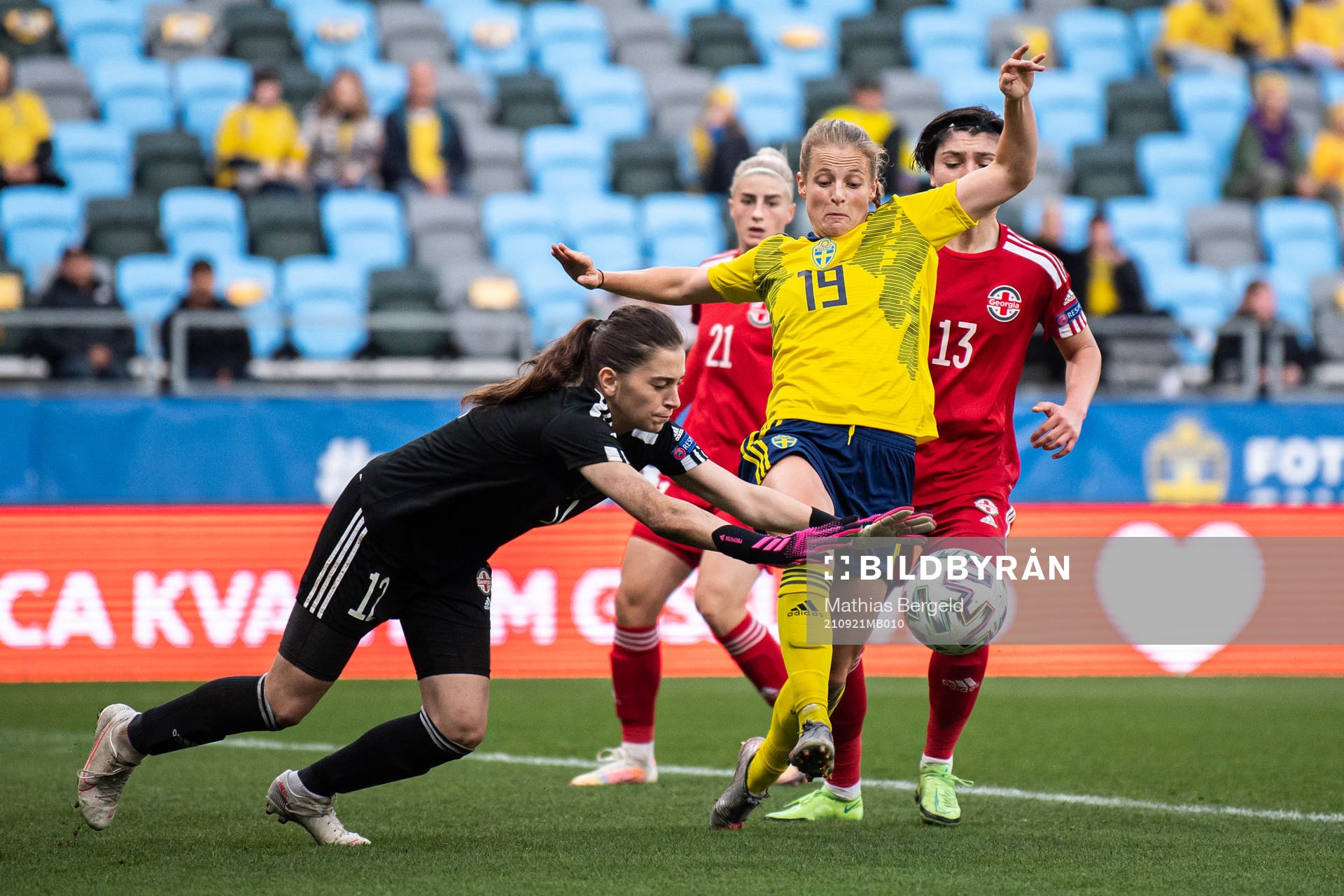 Goalkeeper Tatia abunia of Georgia and Anna Anvegård of