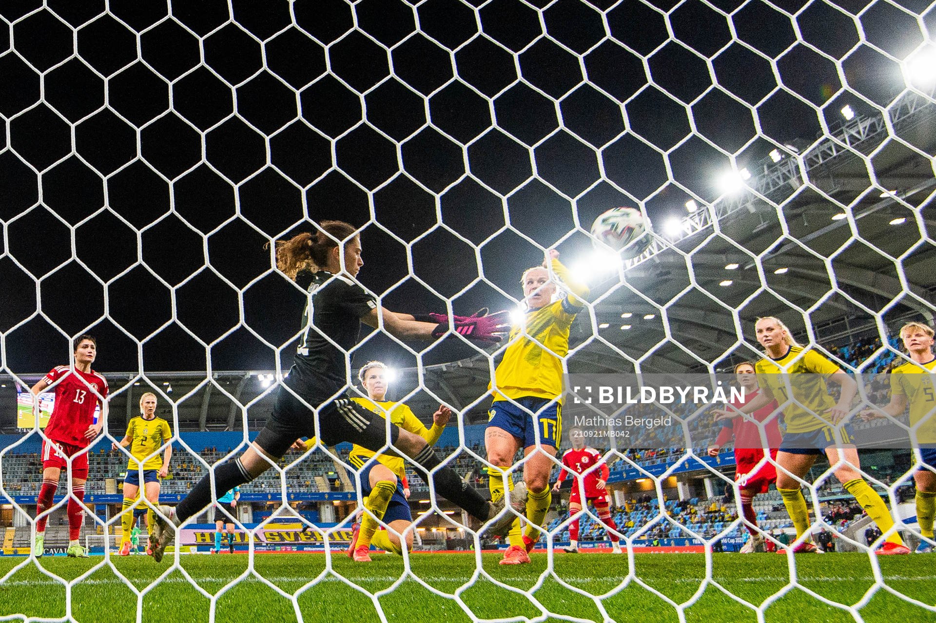 Caroline Seger of Sweden scores 4-0 behind goalkeeper Tatia