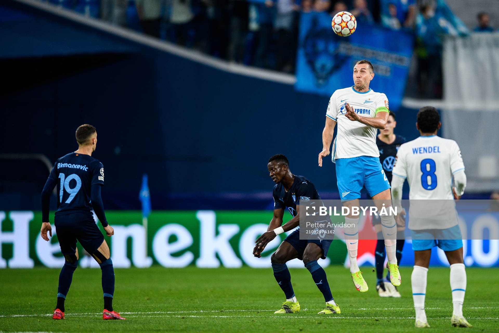 Artem Dzyuba of Zenit and Bonke Innocent of Malmö FF