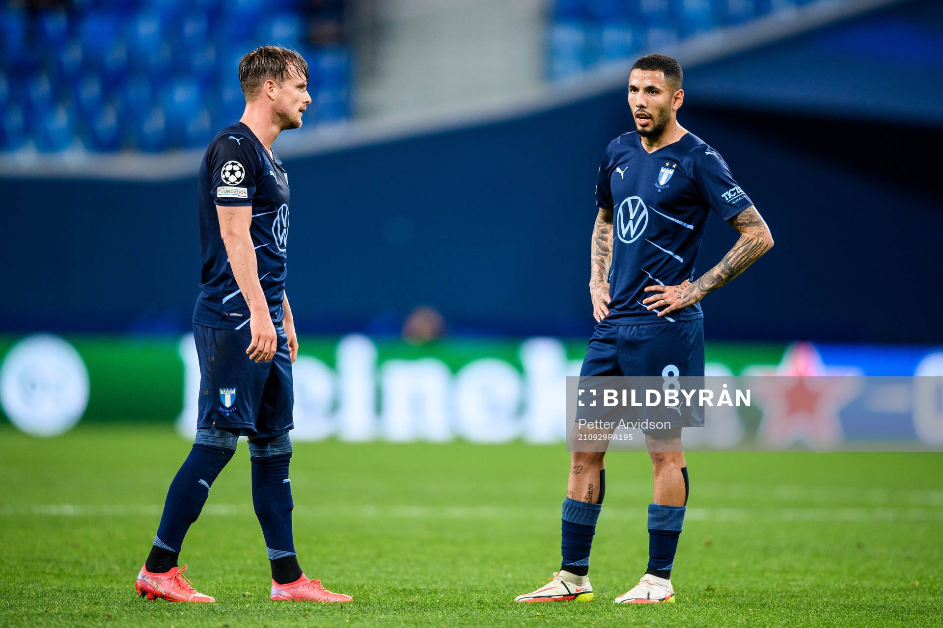 Eric Larsson and Sergio Pena of Malmö FF look dejected