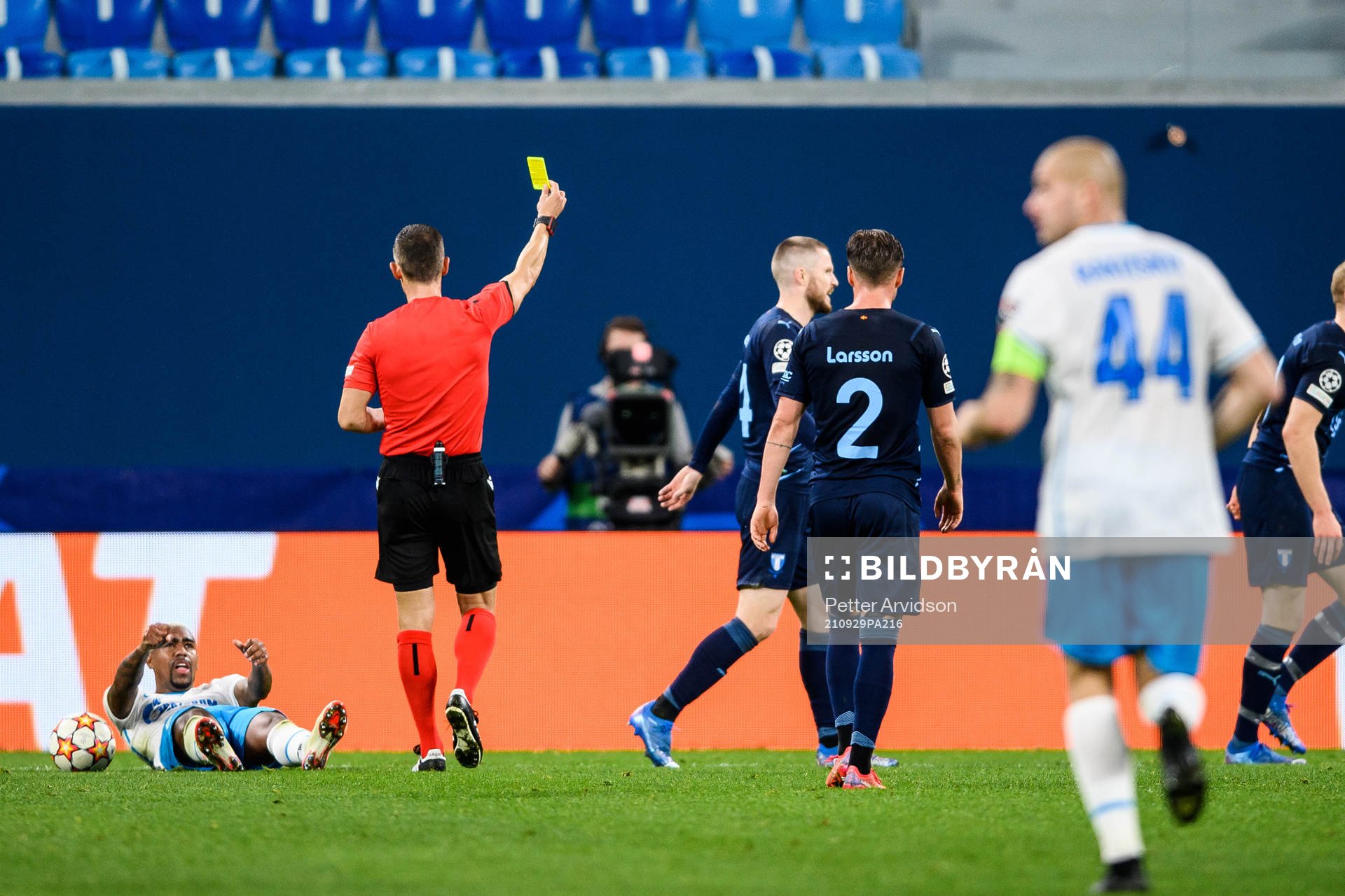 Franz Brorsson of Malmö FF is shown a yellow card by