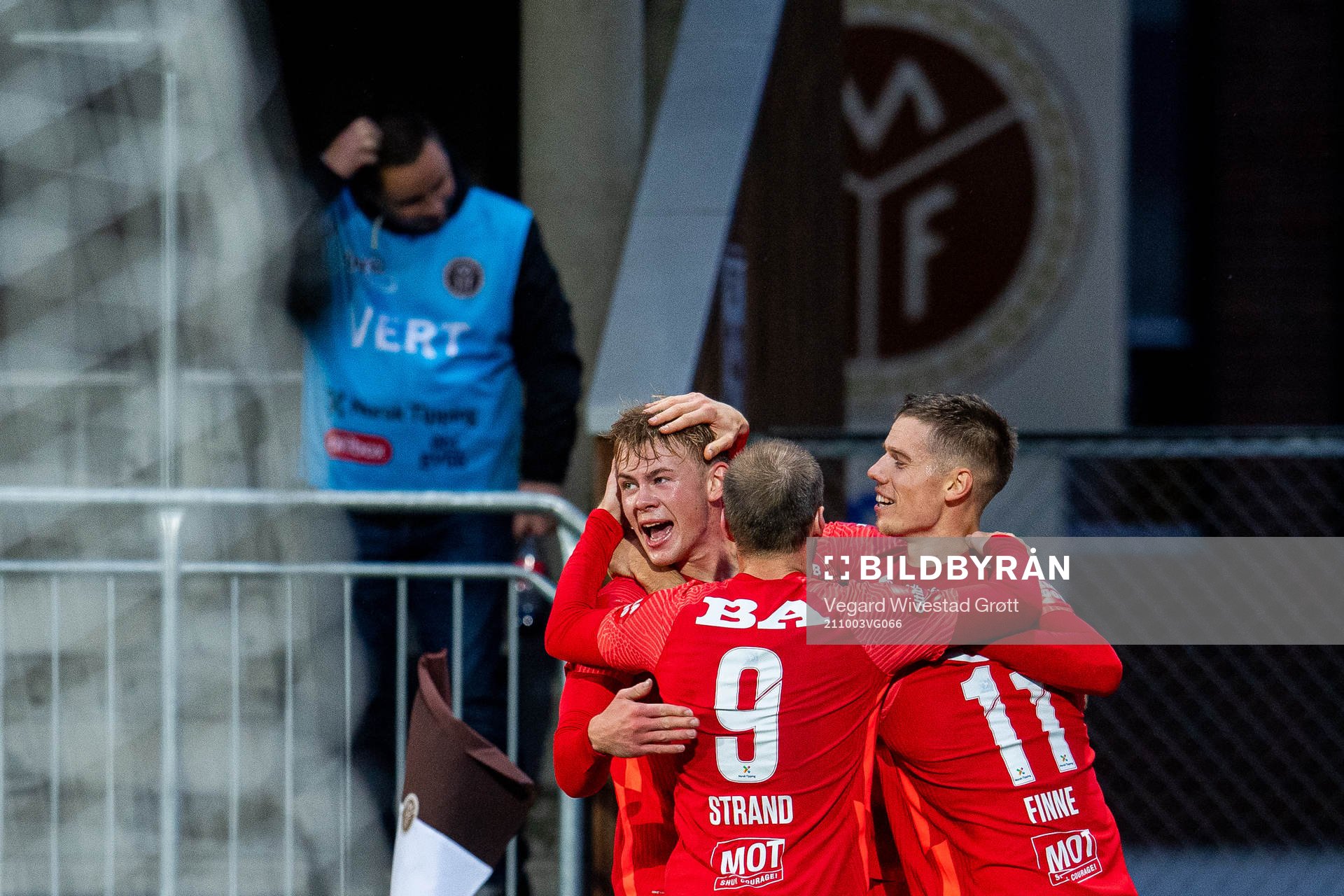 Robert Taylor of Brann celebrates with teammates Aune