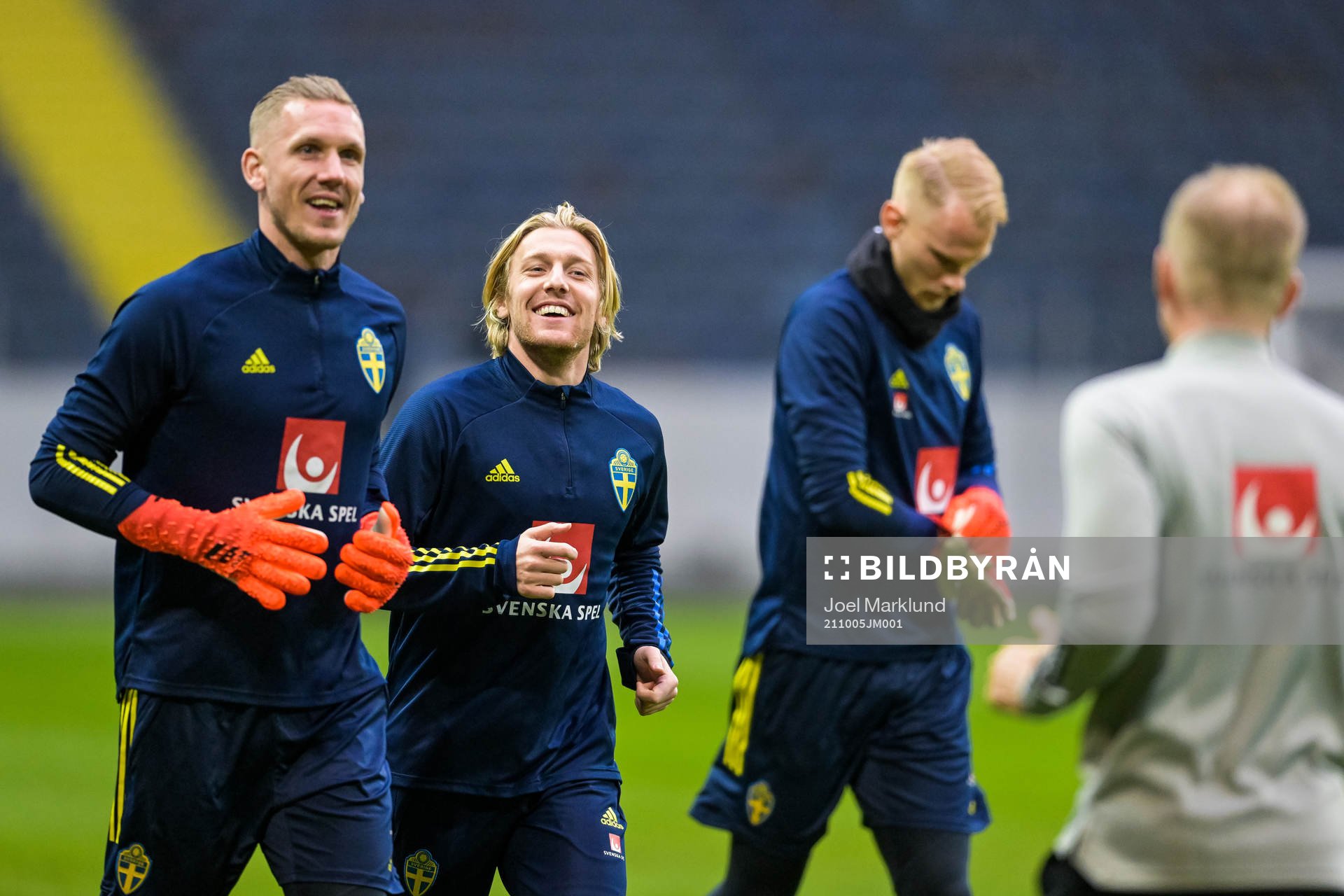 Goalkeeper Robin Olsen and Emil Forsberg of the Swedish
