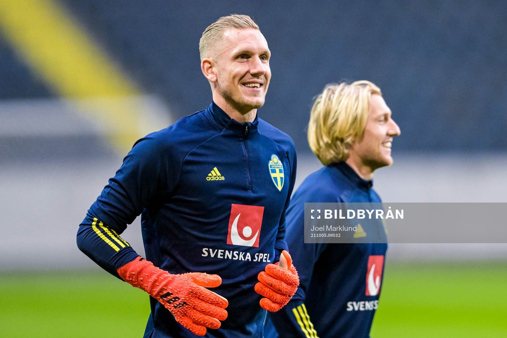 Goalkeeper Robin Olsen and Emil Forsberg  of the Swedish