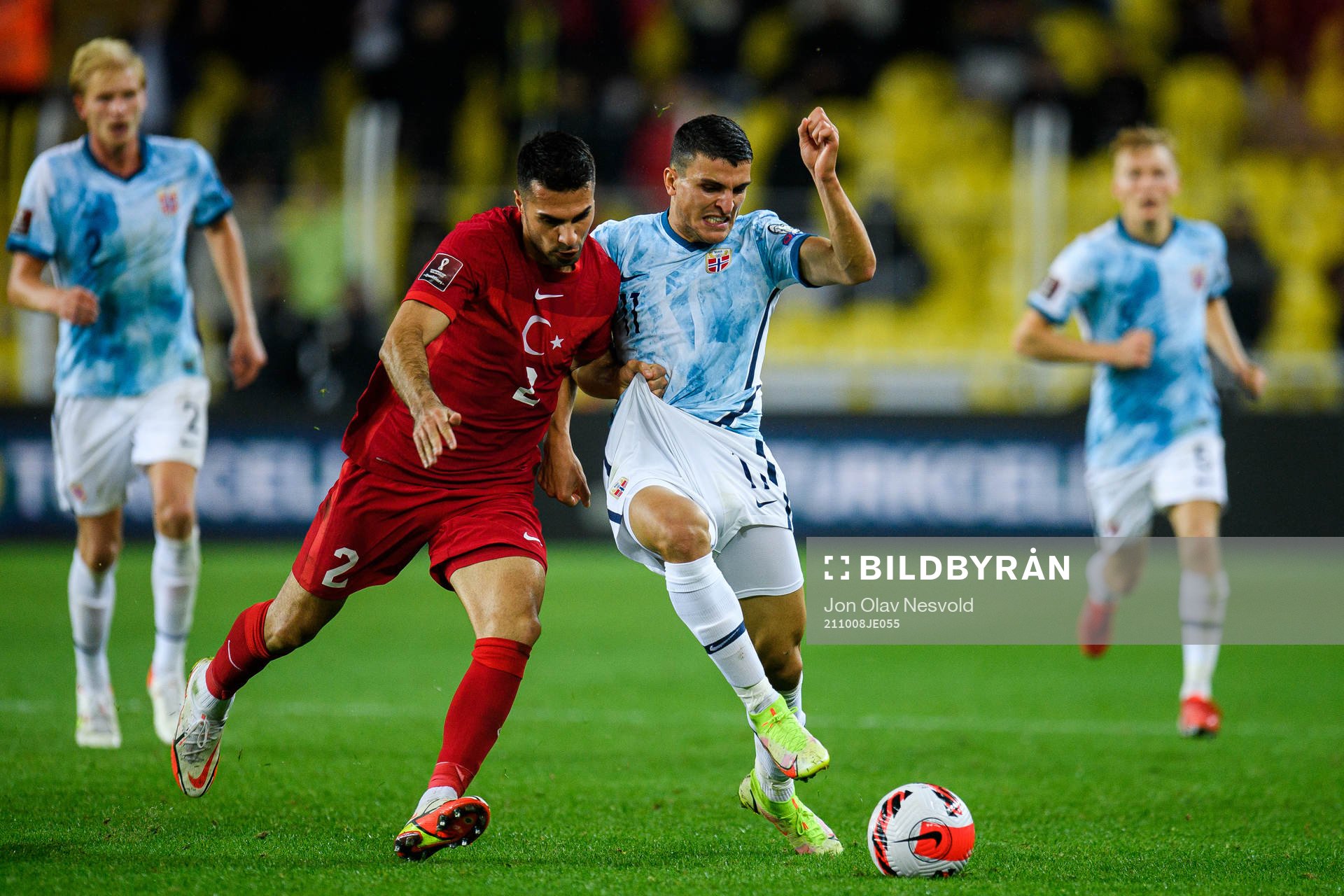Zeki Celik of Turkey and Mohamed Elyounoussi of Norway