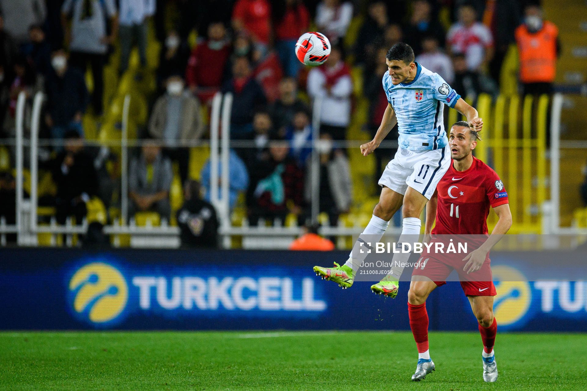 Mohamed Elyounoussi of Norway and Yusuf Yazici of Turkey