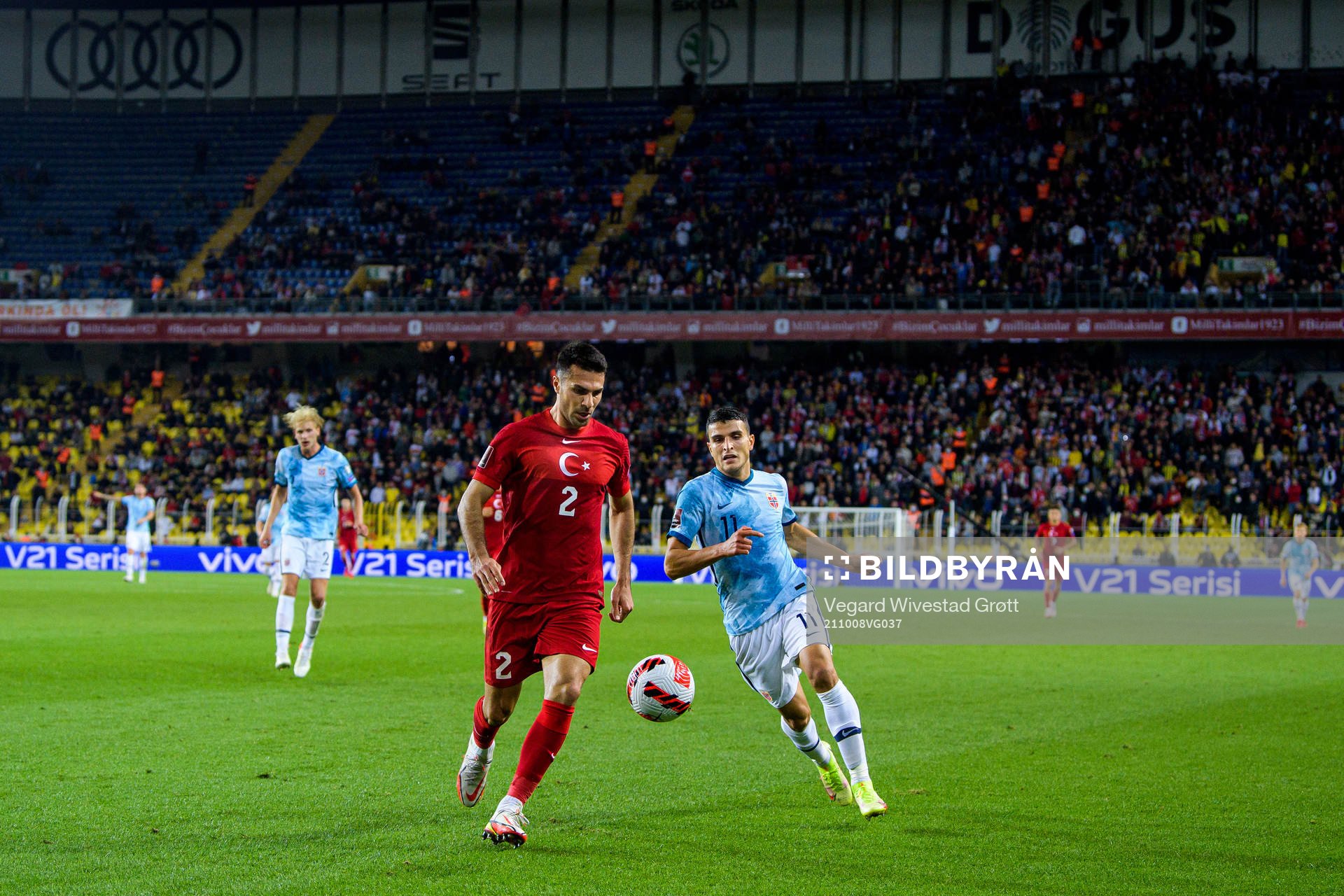 Zeki Celik of Turkey and Mohamed Elyounoussi of Norway