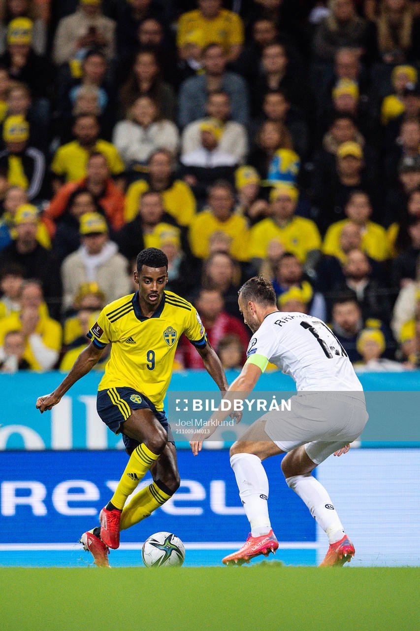 Alexander Isak of Sweden and Amir Rrahmani of Kosovo