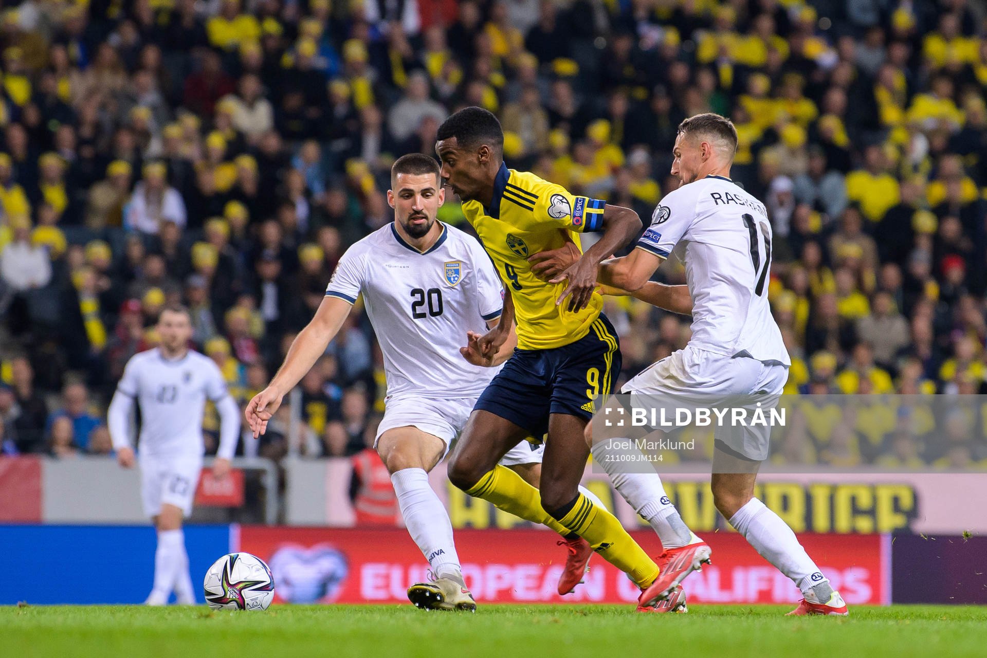 Ibrahim Dresevic and Florian Loshaj of Kosovo are being