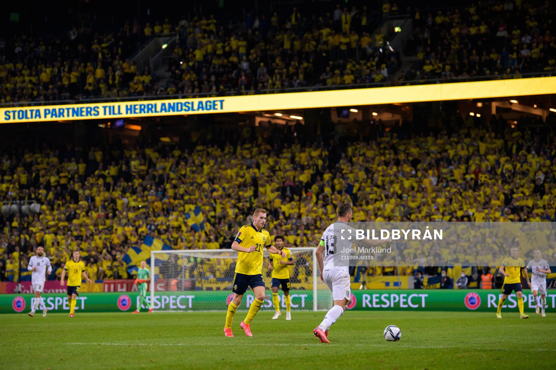 Dejan Kulusevski of Sweden and Amir Rrahmani of Kosovo