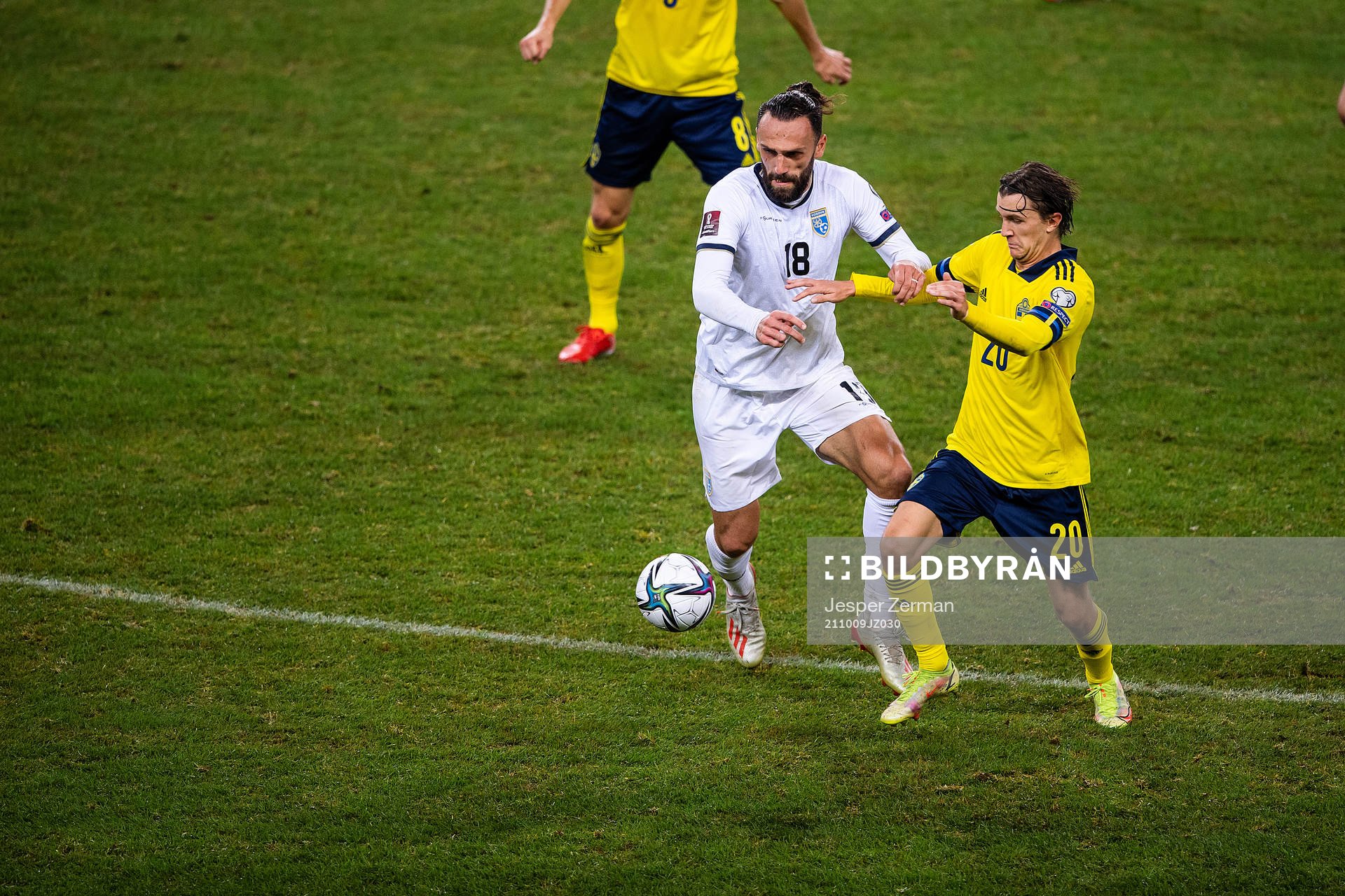 Vedat Muriqi of Kosovo and Kristoffer Olsson of Sweden