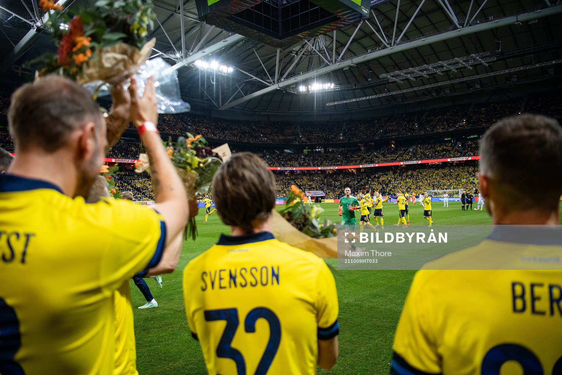 goalkeeper Robin Olsen with former players Sebastian