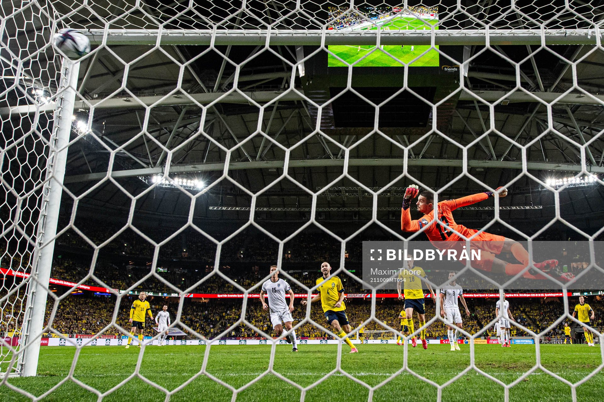 Goalkeeper Arijanet Muric of Kosovo sees Alexander Isak of