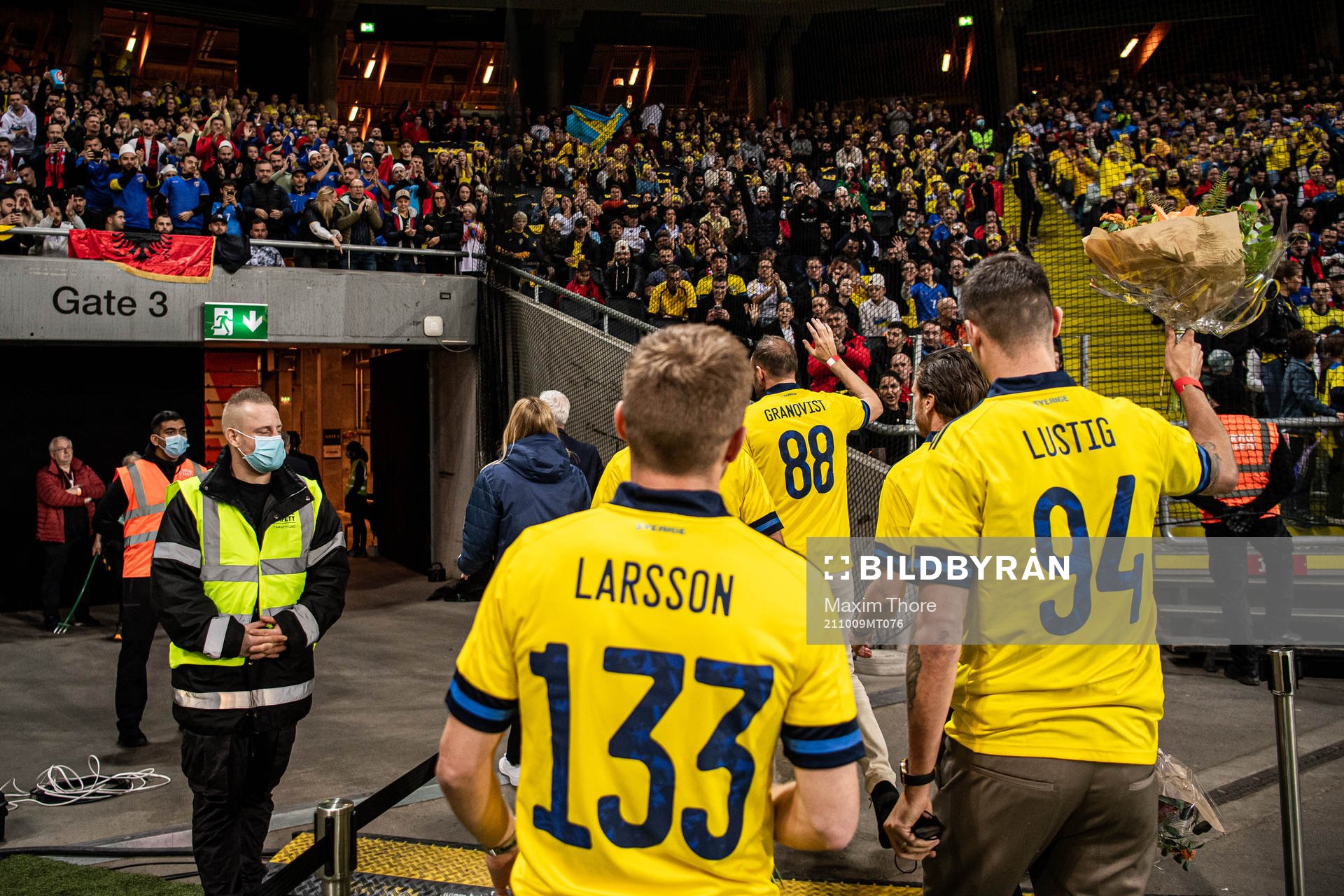 Former football players Sebastian Larsson, Mikael Lustig and Andreas Granqvist with supporters of Sweden ahead of the FIFA World Cup Qualifier football match between Sweden and Kosovo on October 9, 2021 in Stockholm.