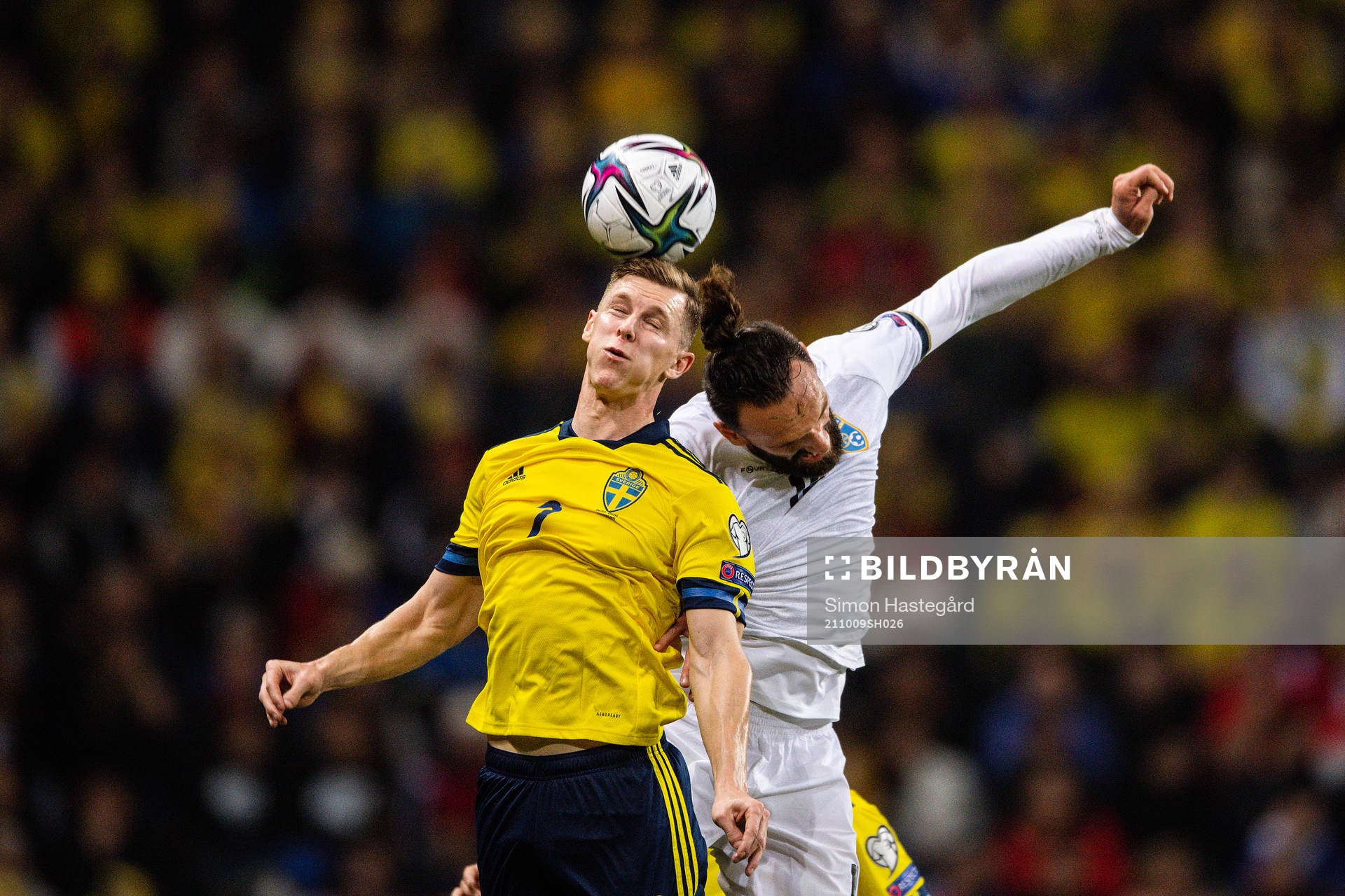 Emil Krafth of Sweden and Vedat Muriqi of Kosovo