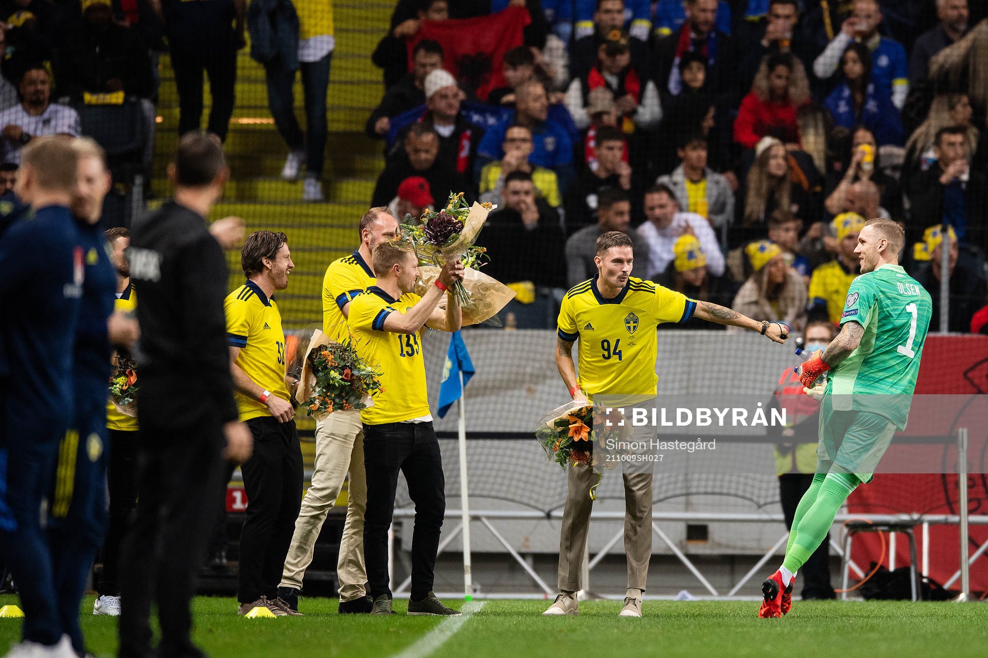 goalkeeper Robin Olsen with former players Sebastian