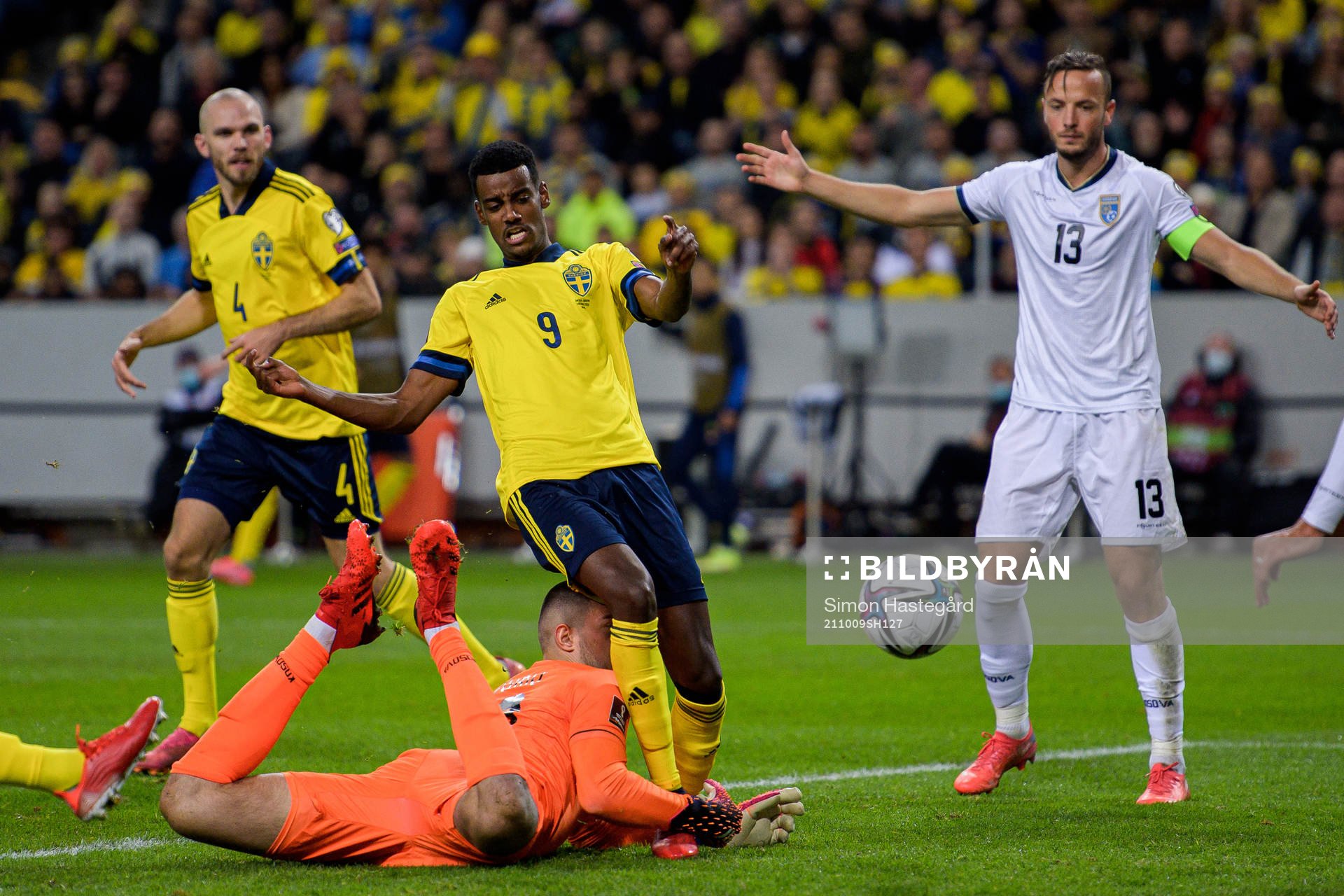 Alexander Isak of Sweden against goalkeeper Arijanet Muric
