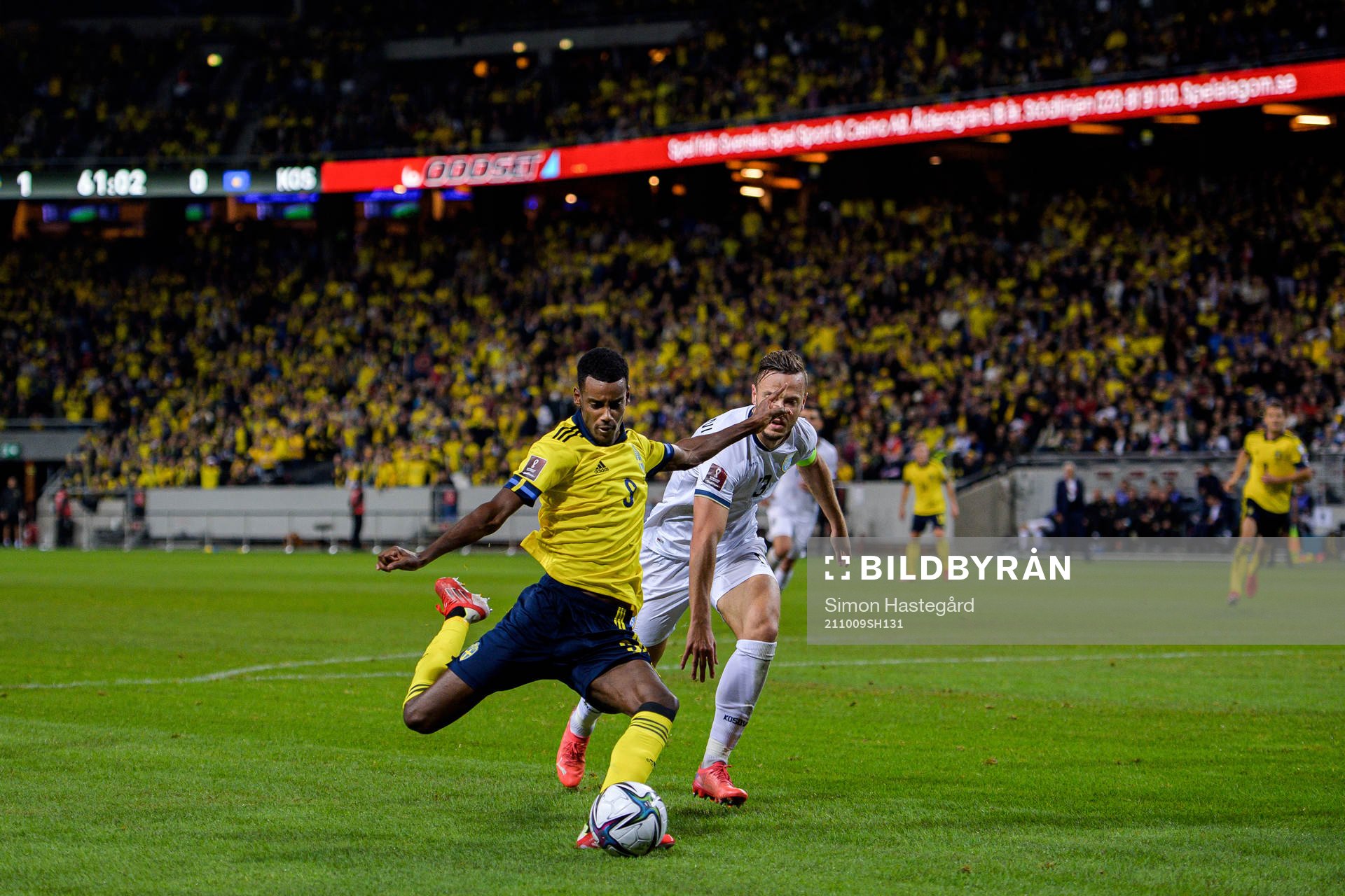 Alexander Isak of Sweden and Amir Rrahmani of Kosovo