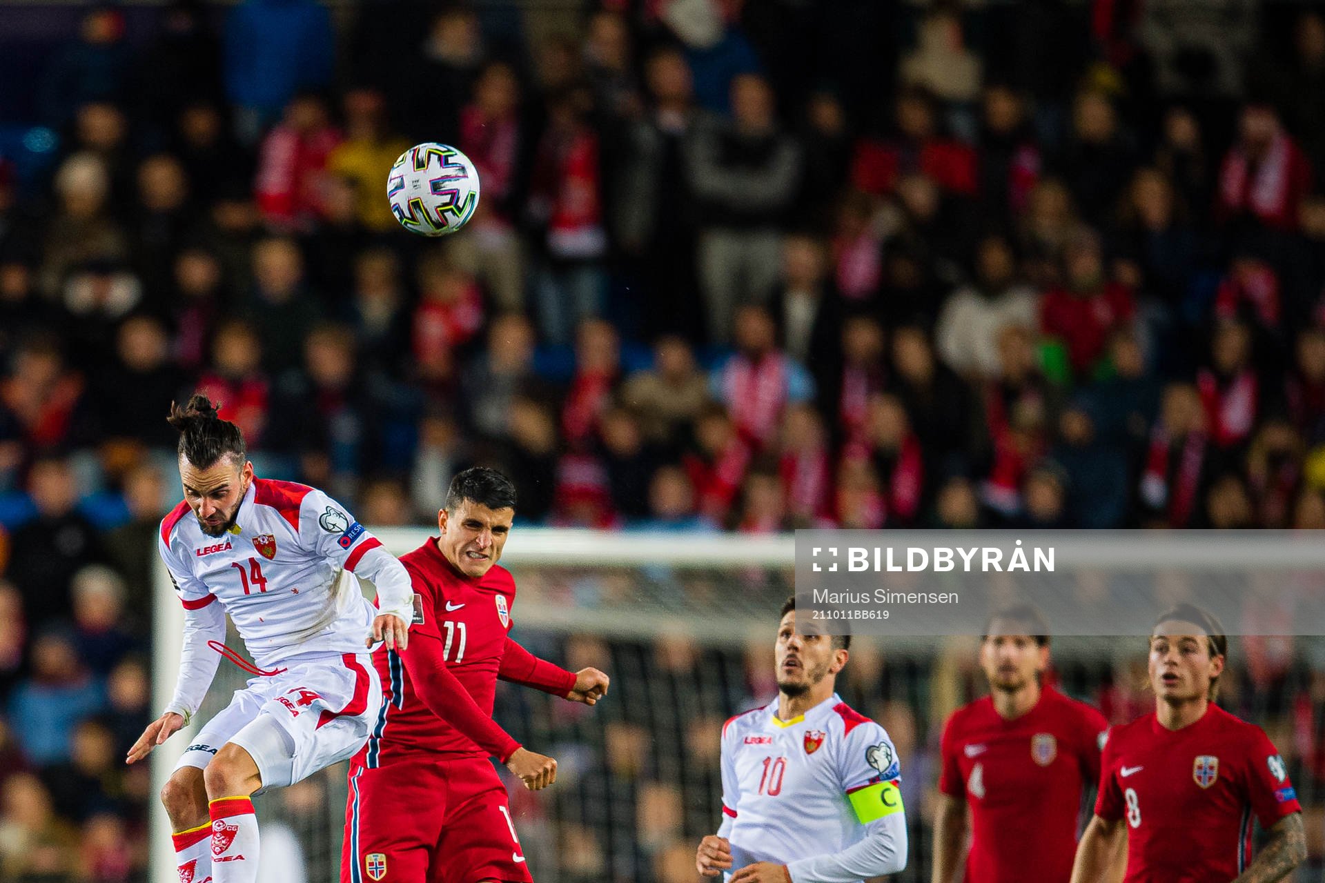 Marko Jankovic of Montenegro and Mohamed Elyounoussi of