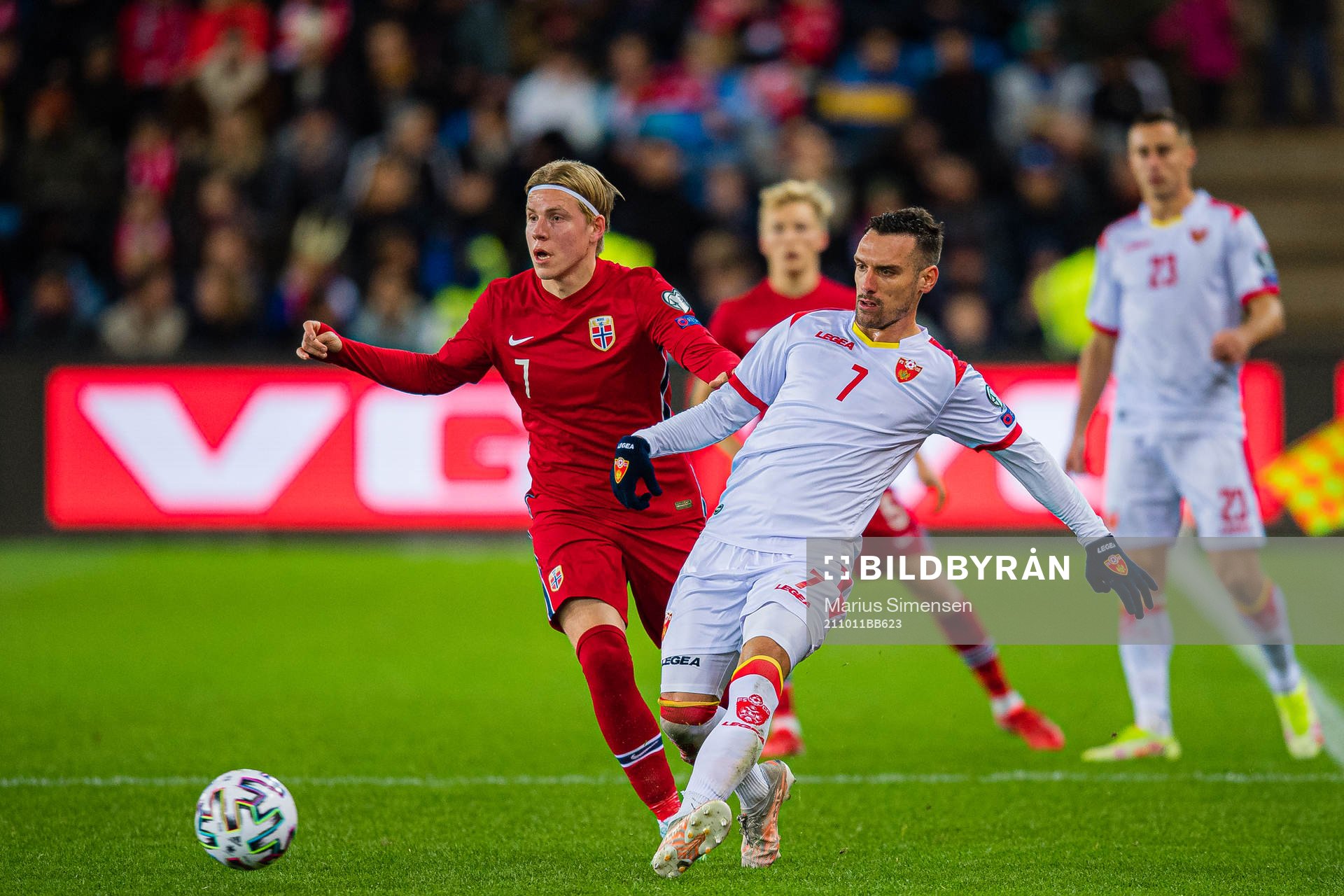 Jens Petter Hauge of Norway and Marko Vesovic of Montenegro