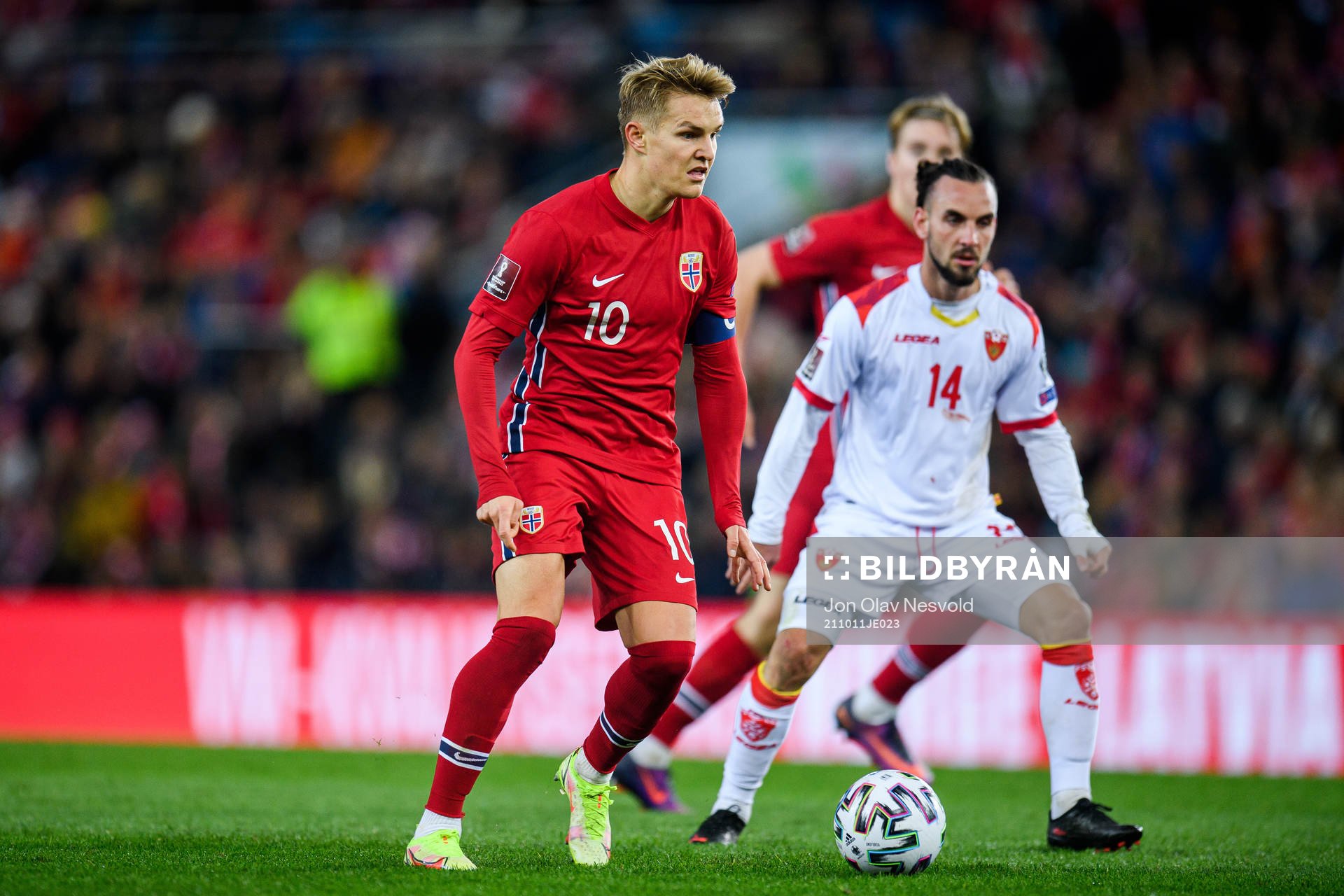 Martin Ødegaard of Norway and Marko Jankovic of Montenegro