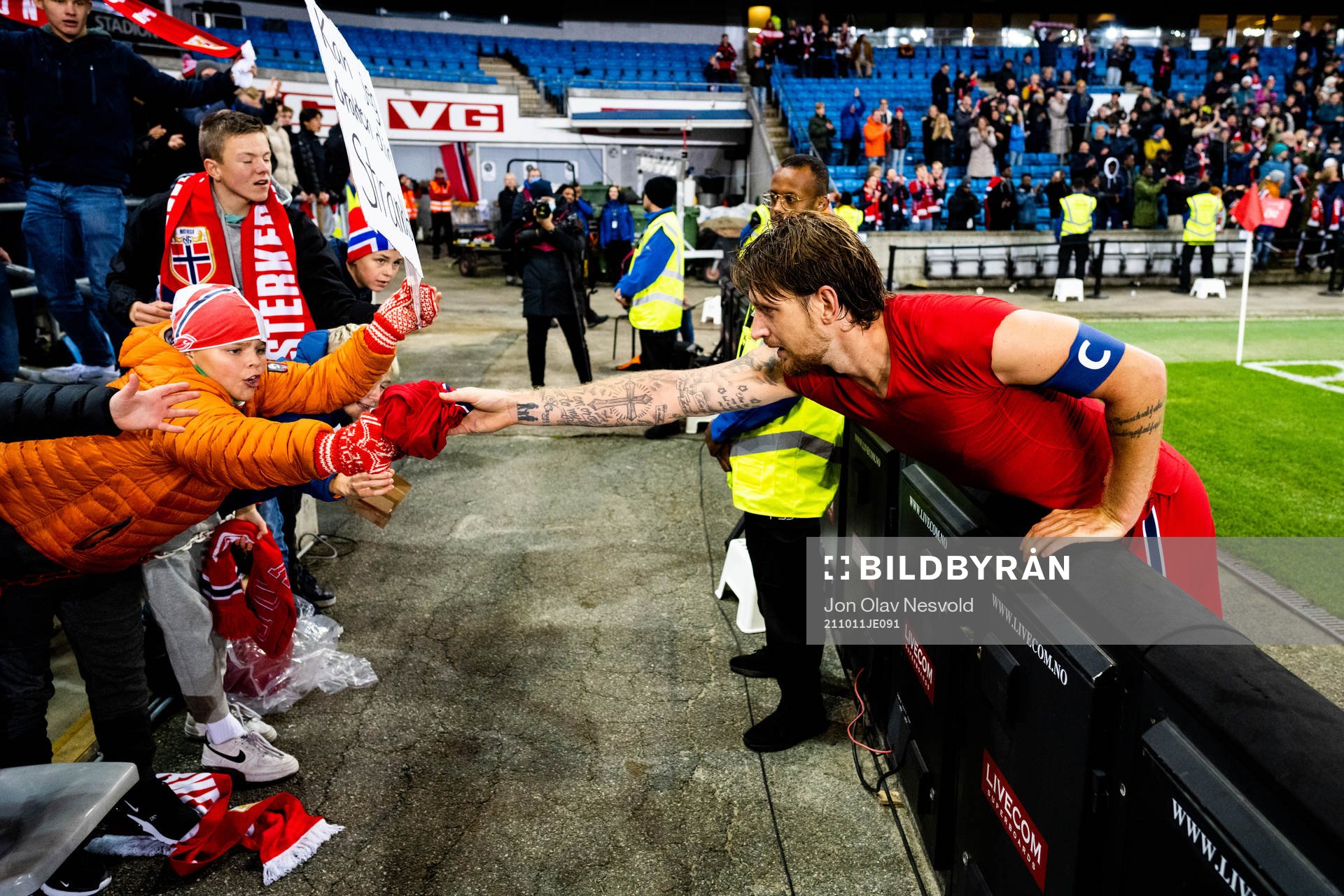 Stefan Strandberg of Norway gives away his jersey to a