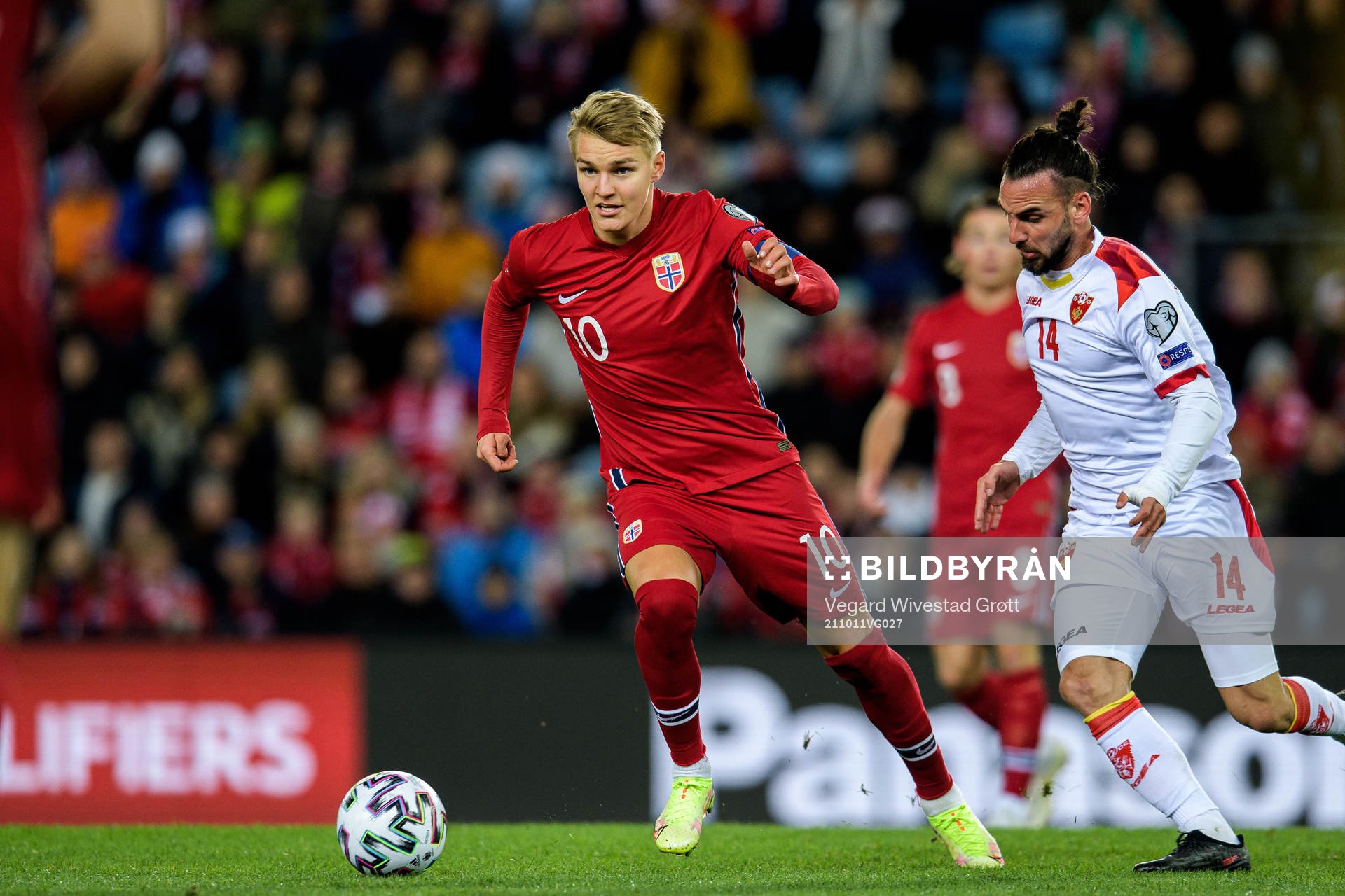 Martin Ødegaard of Norway and Marko Jankovic of Montenegro