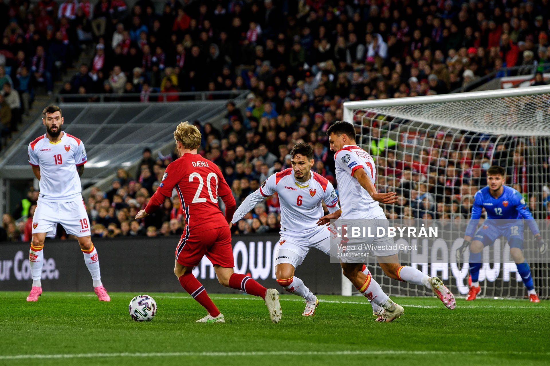 Mats Møller Dæhli of Norway and Zarko Tomasevic of Montenegro during the FIFA World Cup Qualifier football match between Norway and Montenegro on October 11, 2021 in Oslo.