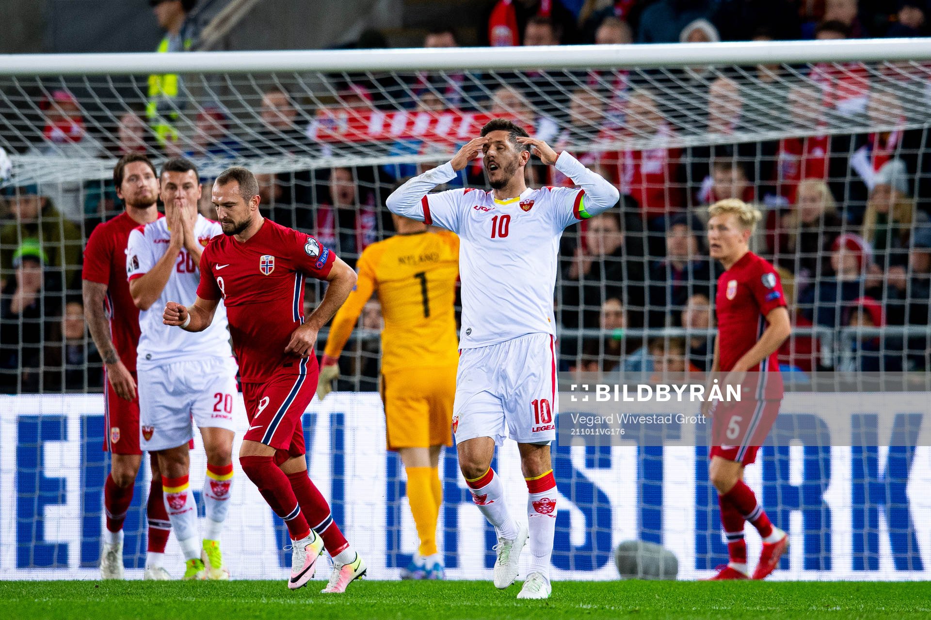 Stevan Jovetic of Montenegro looks dejected