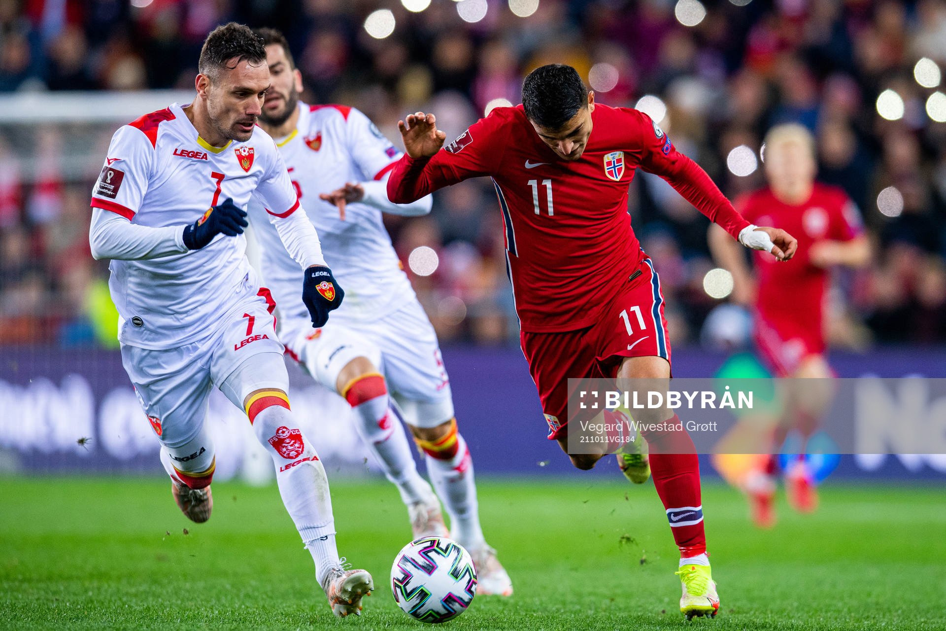 Marko Vesovic of Montenegro and Mohamed Elyounoussi of