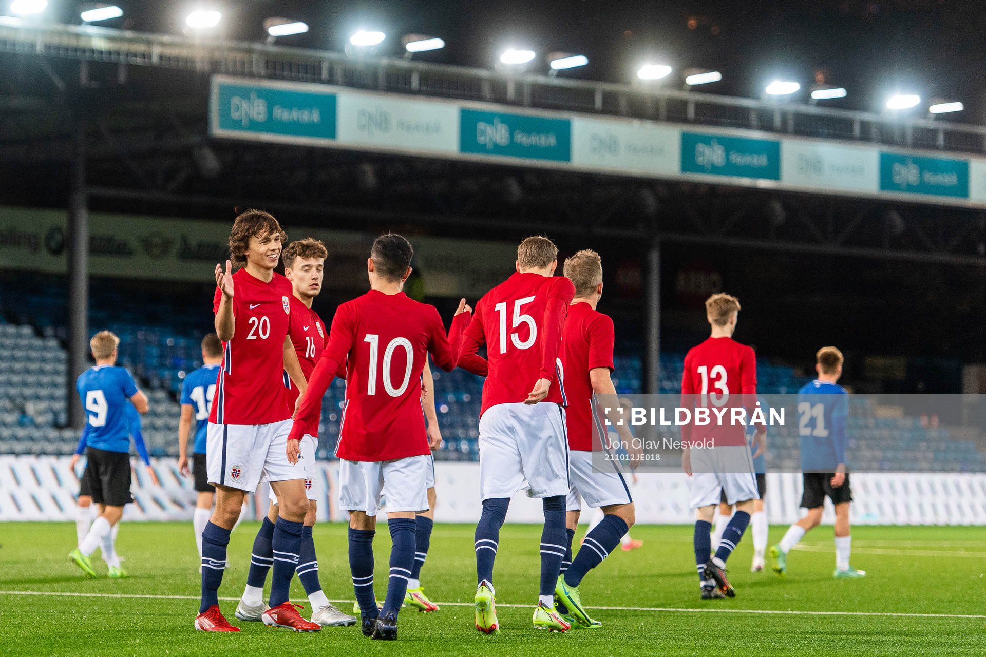 Osame Sahraoui and Halldor Stenevik celebrate with Martin