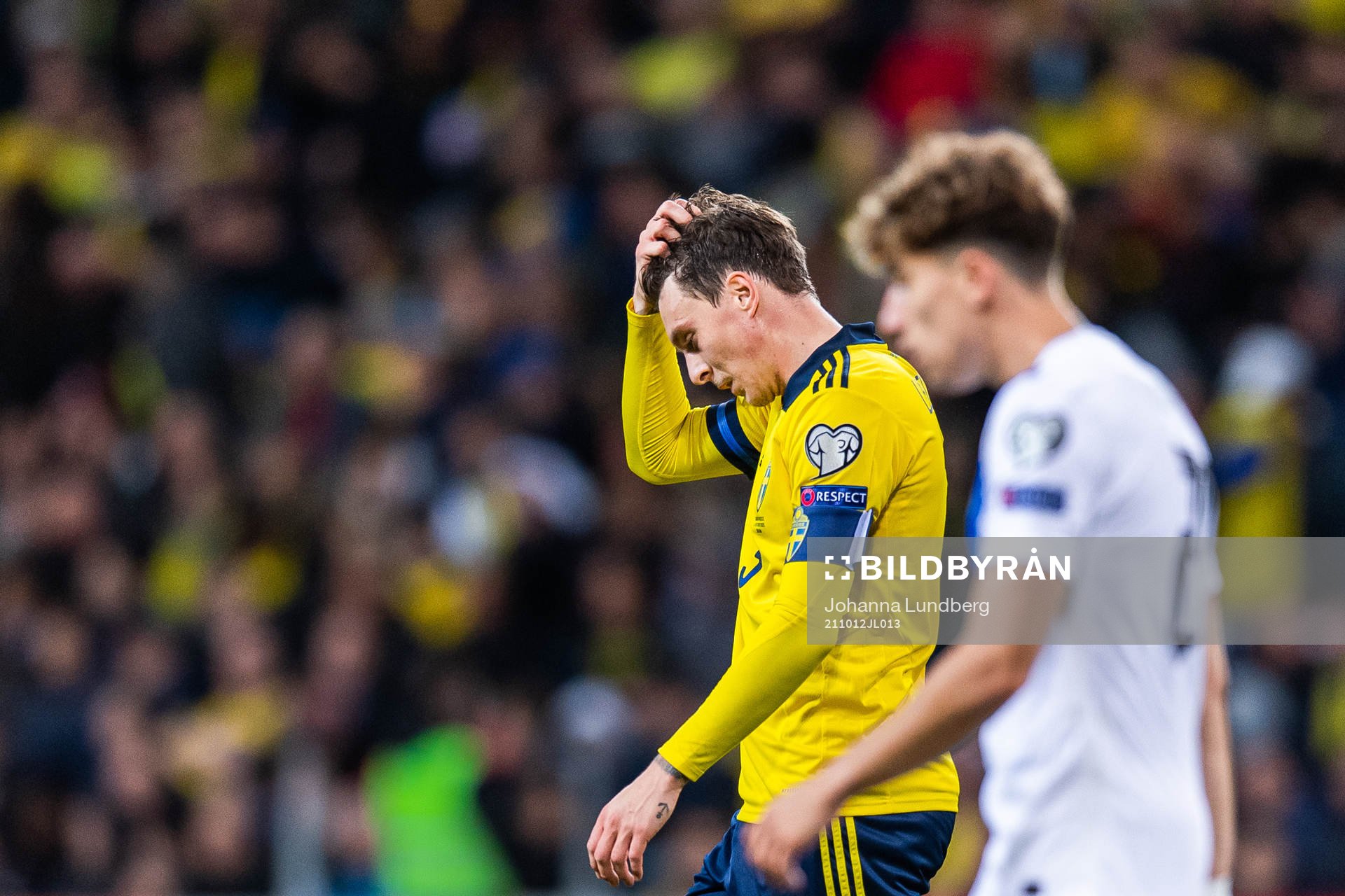 Victor Nilsson Lindelöf of Sweden looks dejected