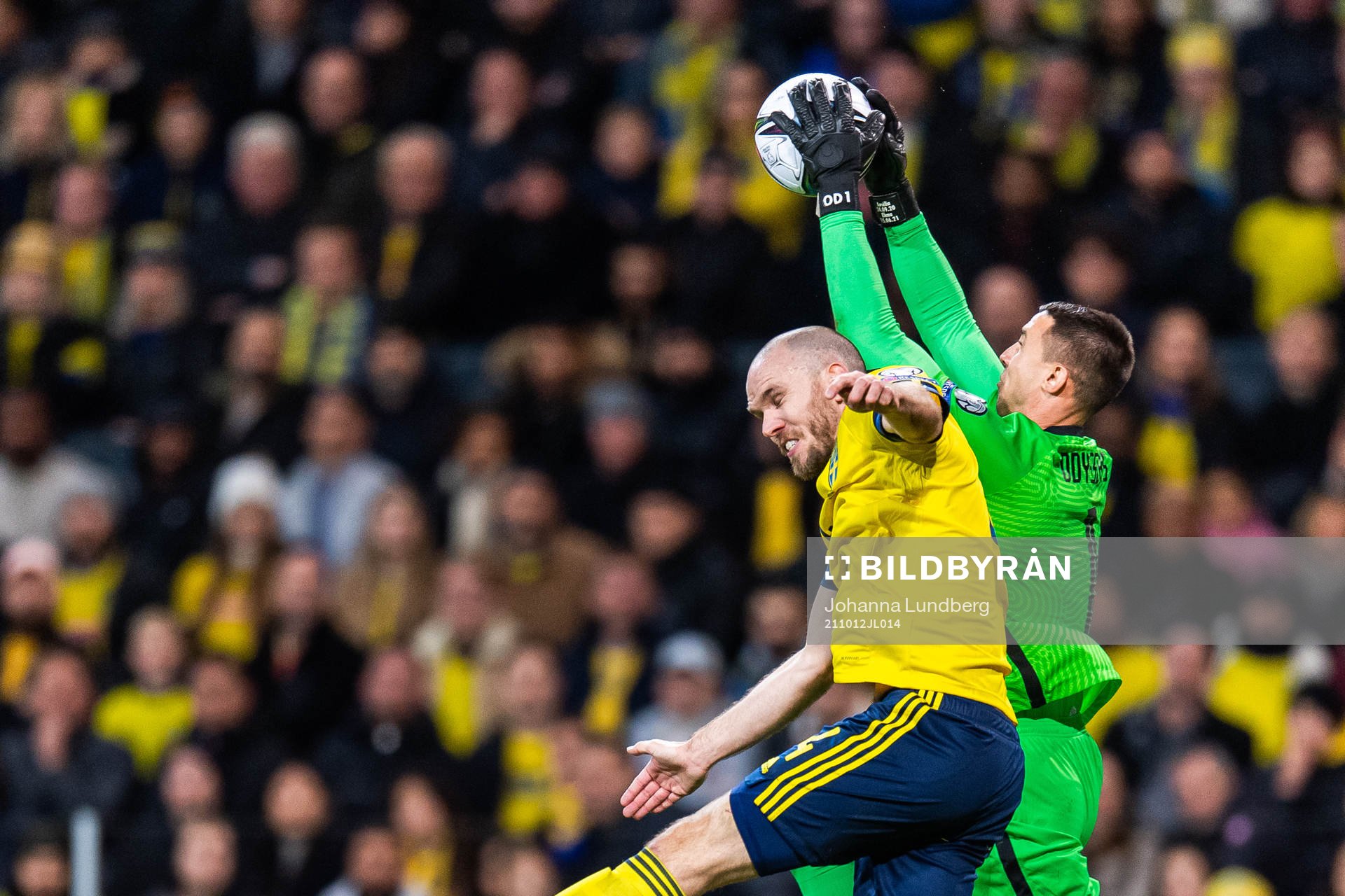 Marcus Danielson of Sweden and goalkeeper Odisseas