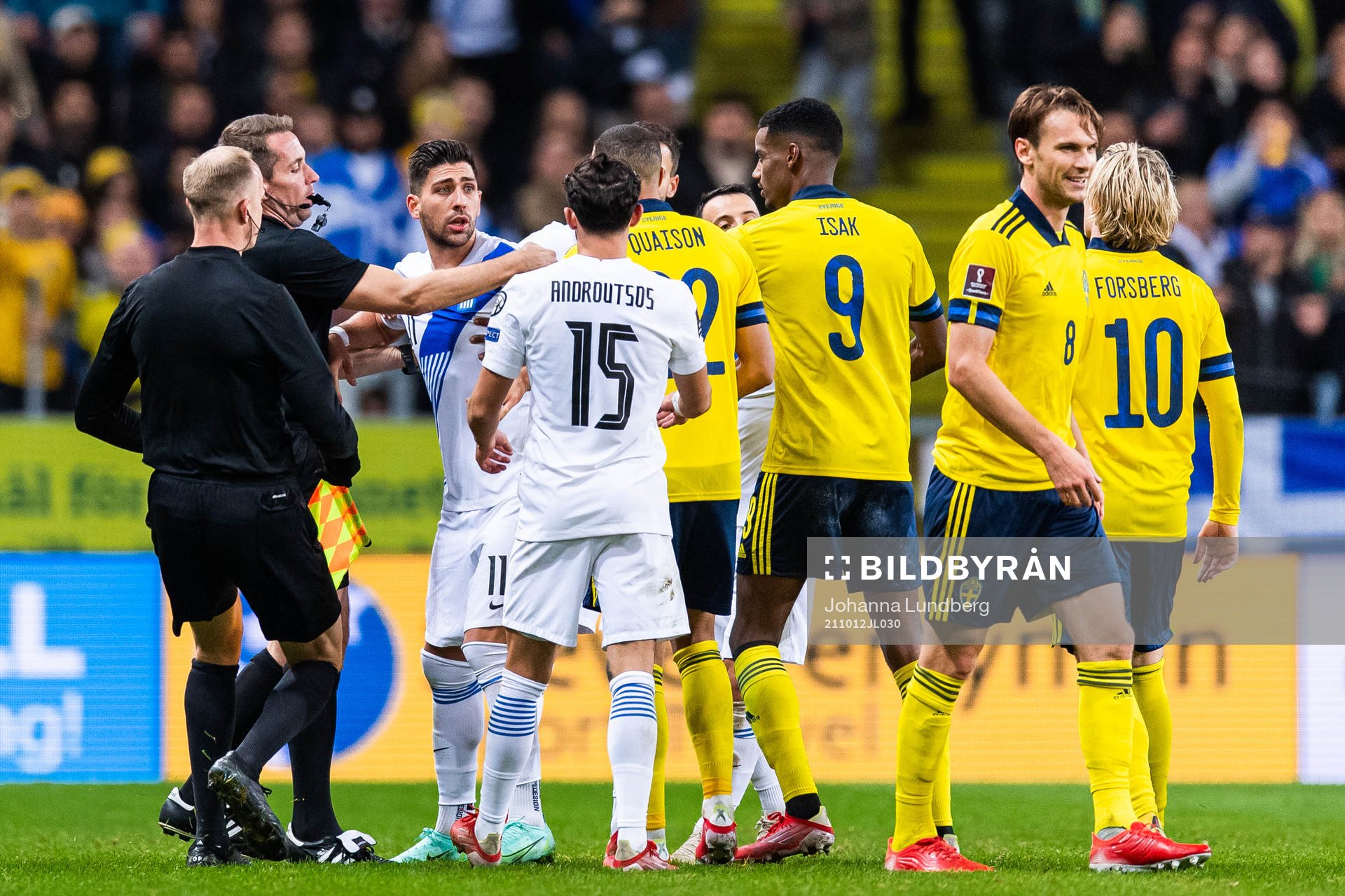 Tasos Bakasetas of Greece and Robin Quaison of Sweden