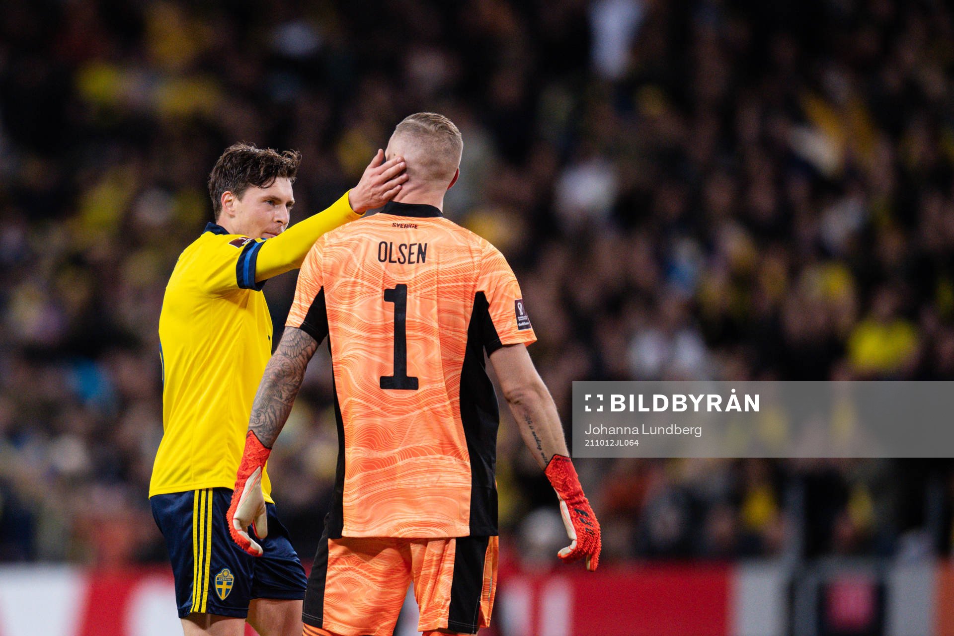 Victor Nilsson Lindelöf and goalkeeper Robin Olsen of