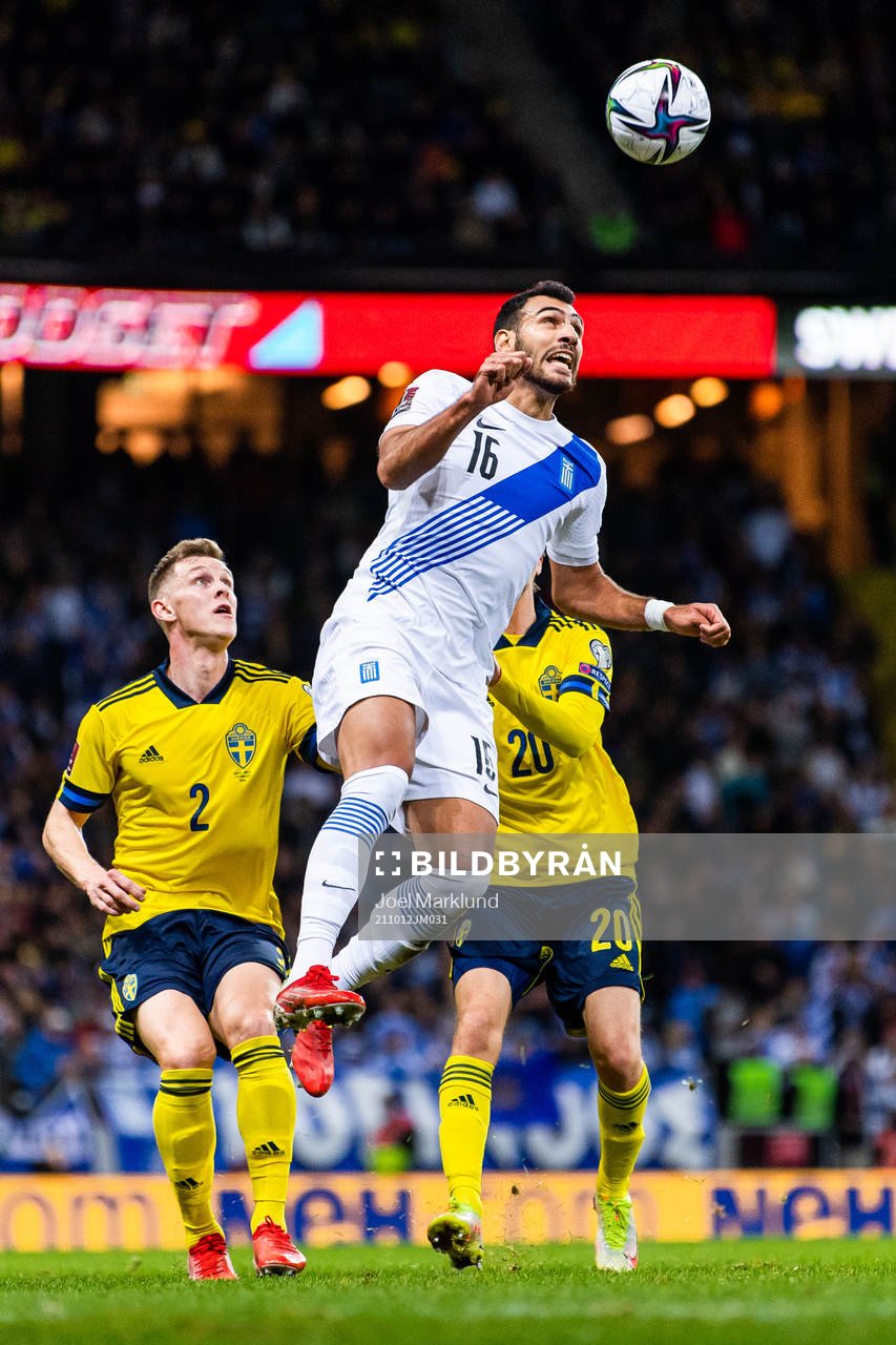 Emil Krafth and Kristoffer Olsson of Sweden compete for the